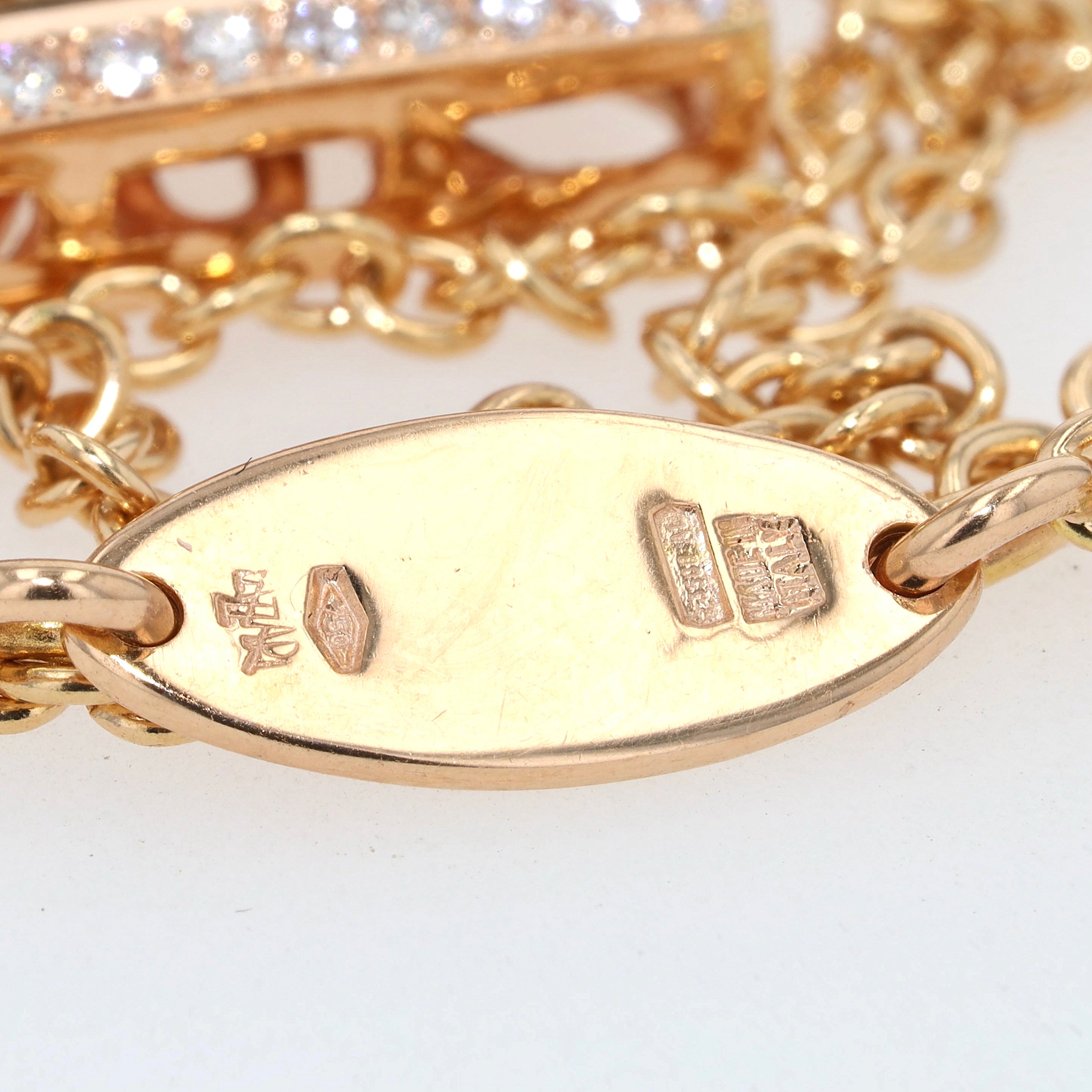 Italienisches Collier in 750er Roségold mit Brillanten und einem Rutil-Quarz, Goldplatte mit Punzen