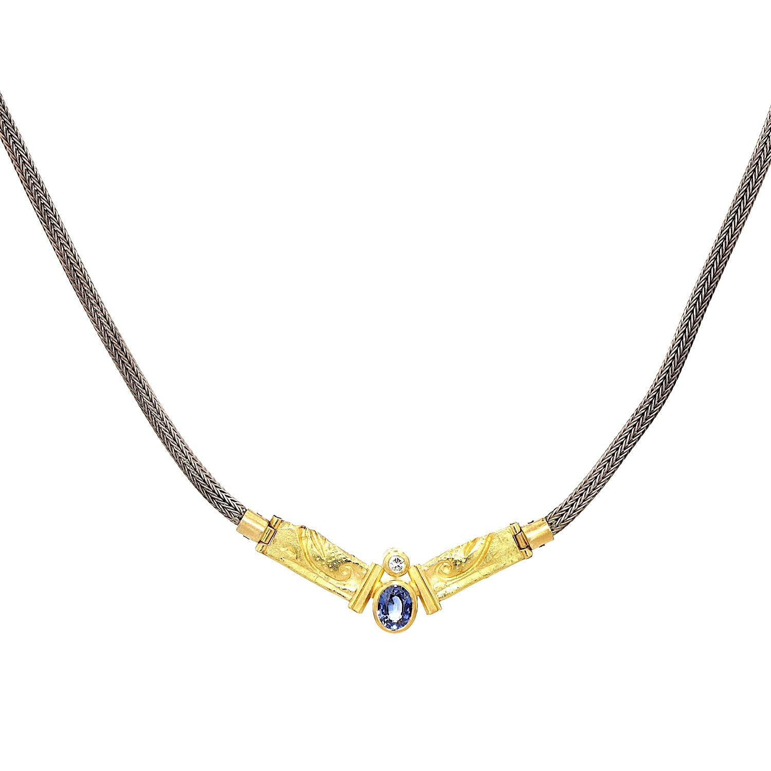 Collier in 750er Gelbgold und Silber mit einem Brillanten und einem Saphir, hängend frontal