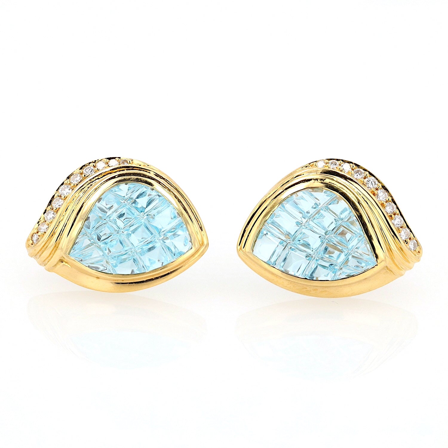 1 Paar Ohrstecker in 750er Gelbgold mit je einem blauen Topas und Brillanten, liegend frontal