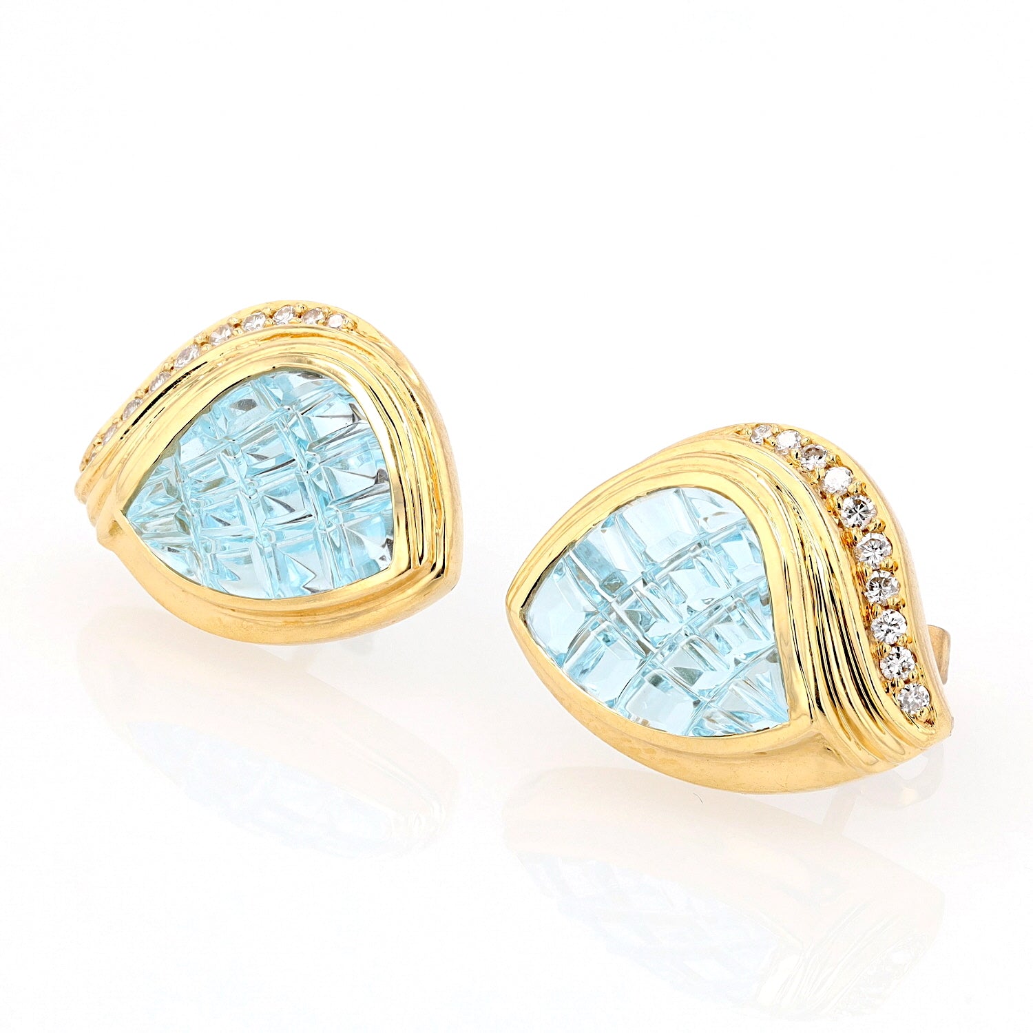 1 Paar Ohrstecker in 750er Gelbgold mit je einem blauen Topas und Brillanten, liegend links gedreht