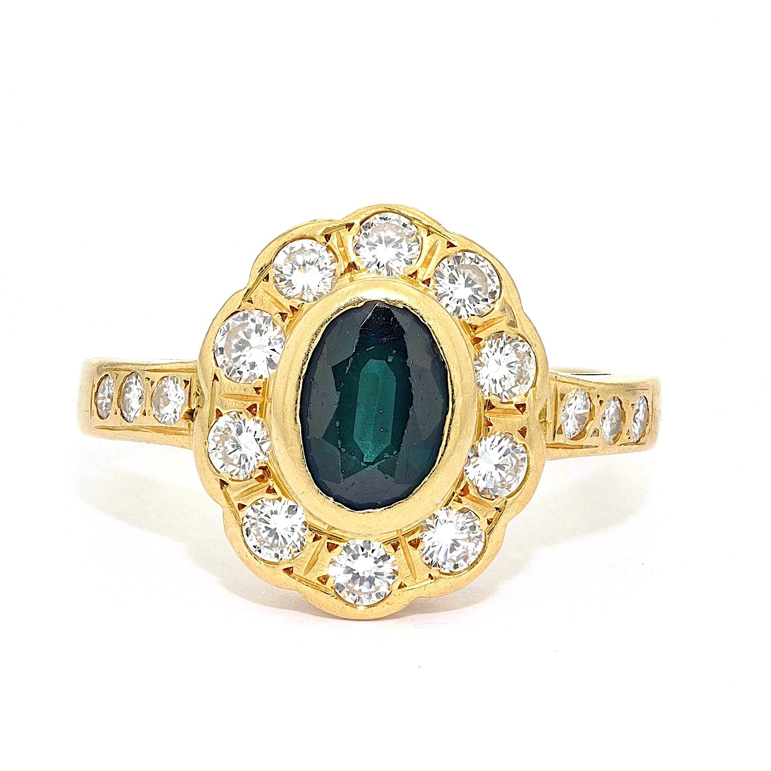 Vintage Ring in 750er Gelbgold mit einem Saphir und Brillanten, liegend frontal