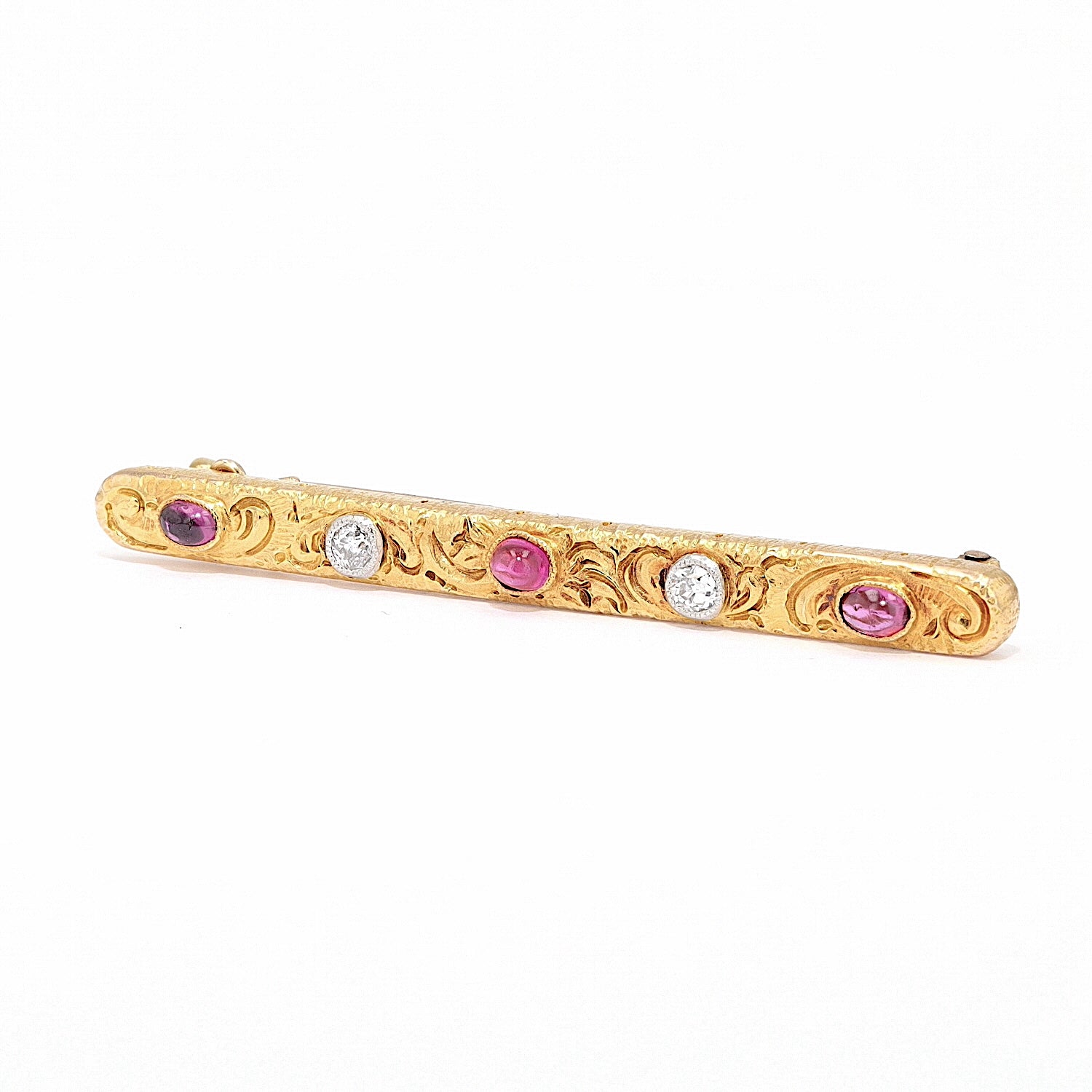 Brosche um 1900 in 750 / 585 Gold mit Rubinen und Diamanten, liegend links gedreht