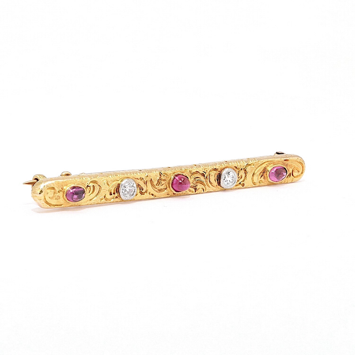 Brosche um 1900 in 750 / 585 Gold mit Rubinen und Diamanten, liegend rechts gedreht