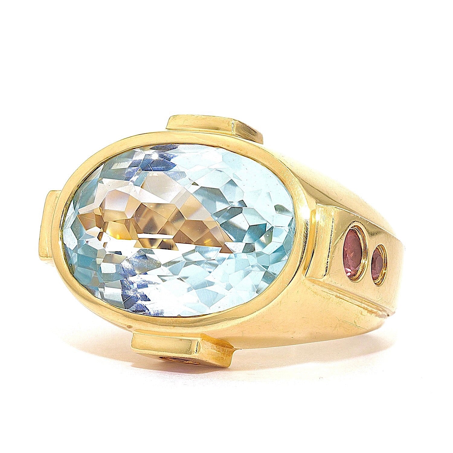 Ring von Jette Joop aus 750er Gelbgold mit einem Topas und Turmalinen, liegend links gedreht