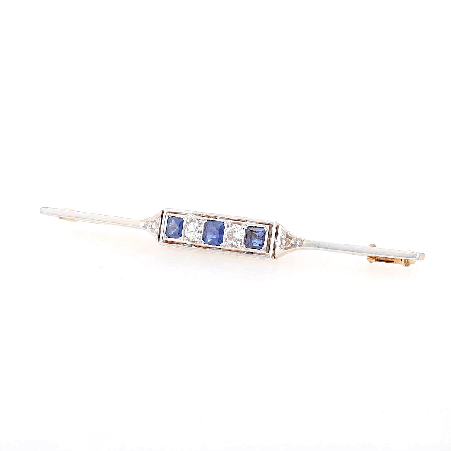 Art Deco Brosche in 585er Rotgold, platiniert mit blauen Saphiren und Diamanten, liegend links gedreht