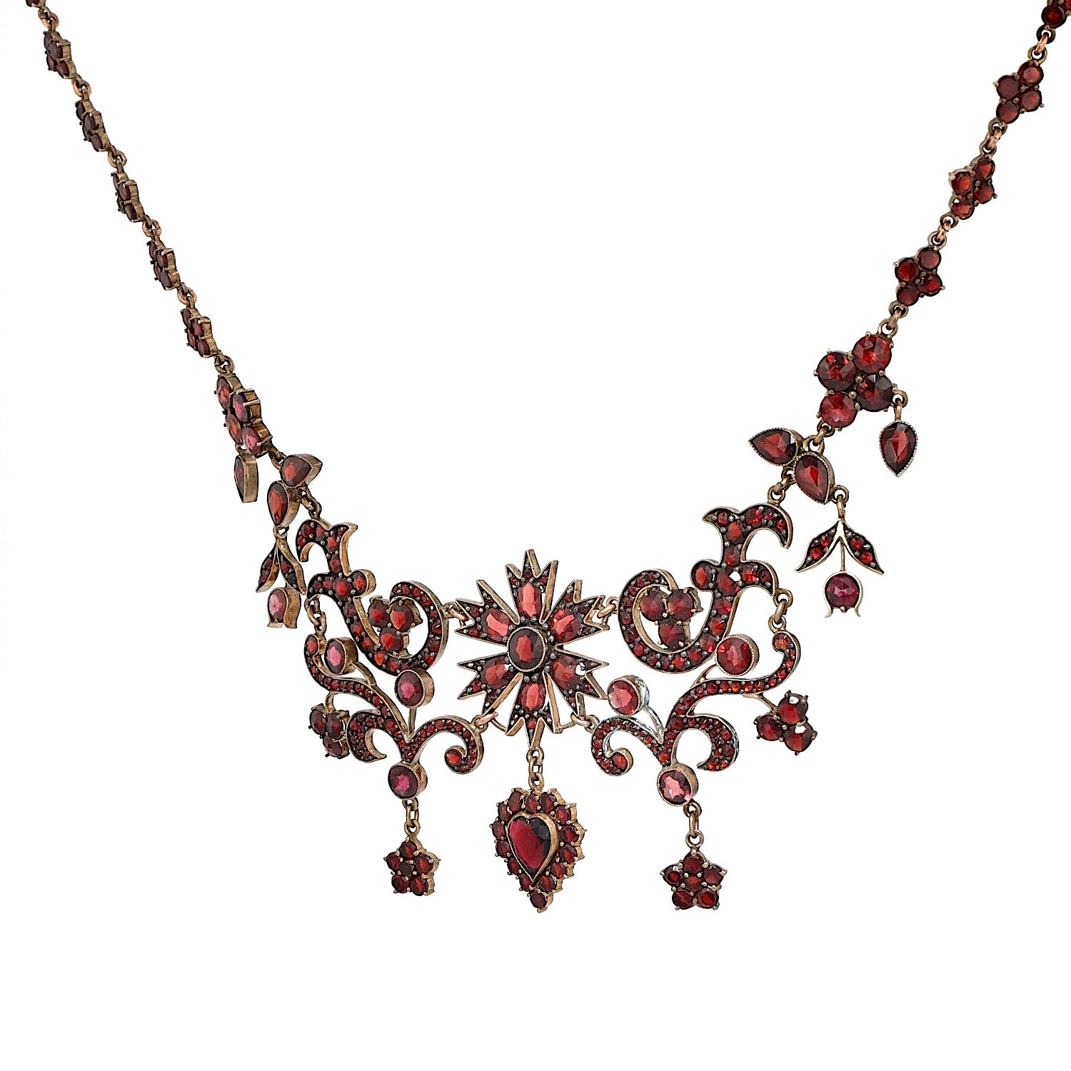 Granatcollier um 1900 aus Tombak, vergoldet, vergoldet, hängend links gedreht