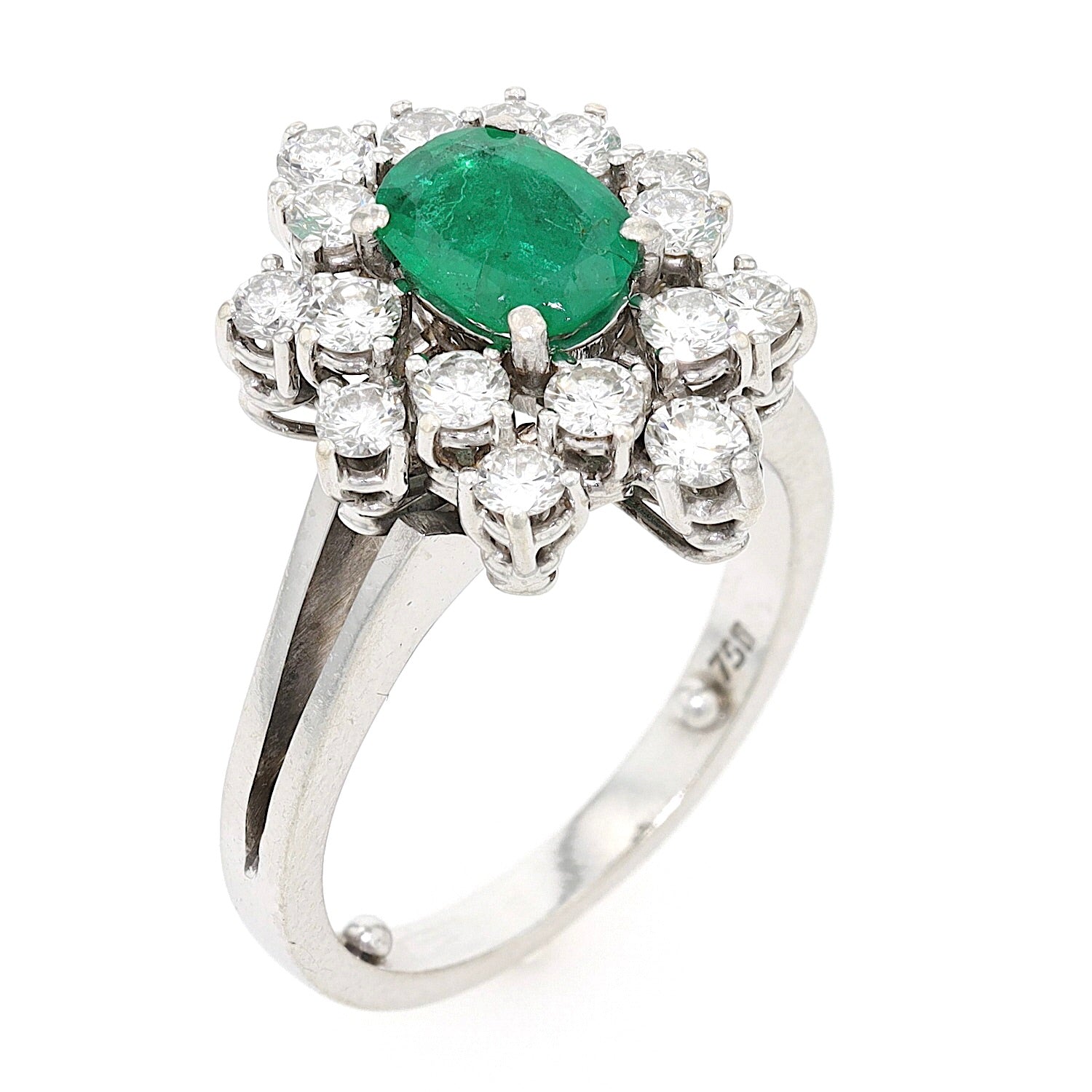 Ring in 750er Weißgold mit einem Smaragd und Brillanten, ges. ca. 1 ct, stehend