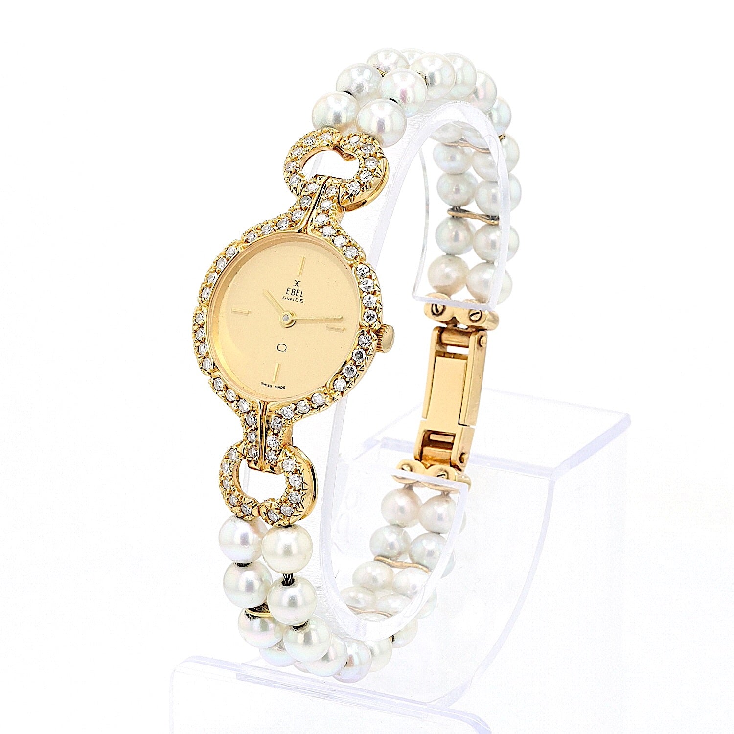 Ebel Damenarmbanduhr in 750er Gelbgold mit Brillanten und Zuchtperlen, stehend inks gedreht