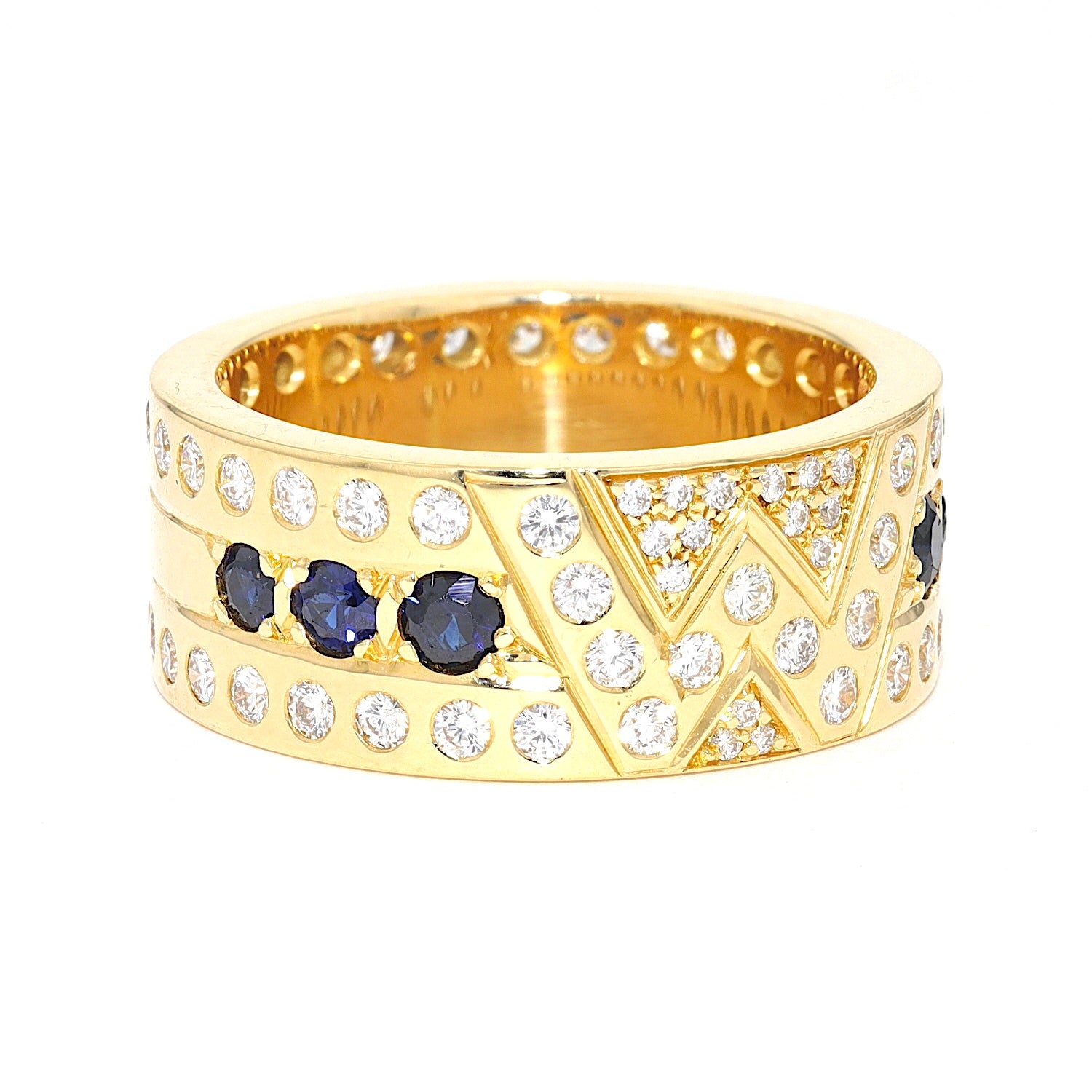 Ring in 750er Gelbgold mit Brillanten und Saphiren, liegend rechts gedreht