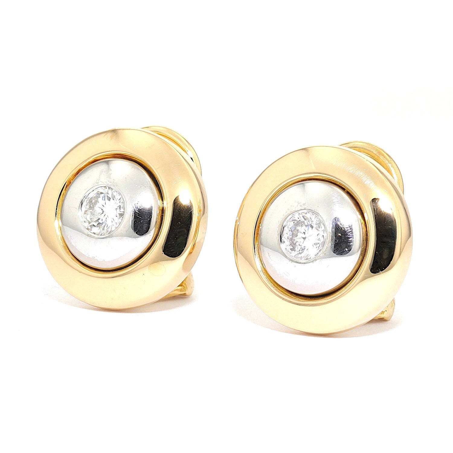 1 Paar Ohrstecker in 750er Gold Bicolor mit je einem Brillanten, liegend links gedreht