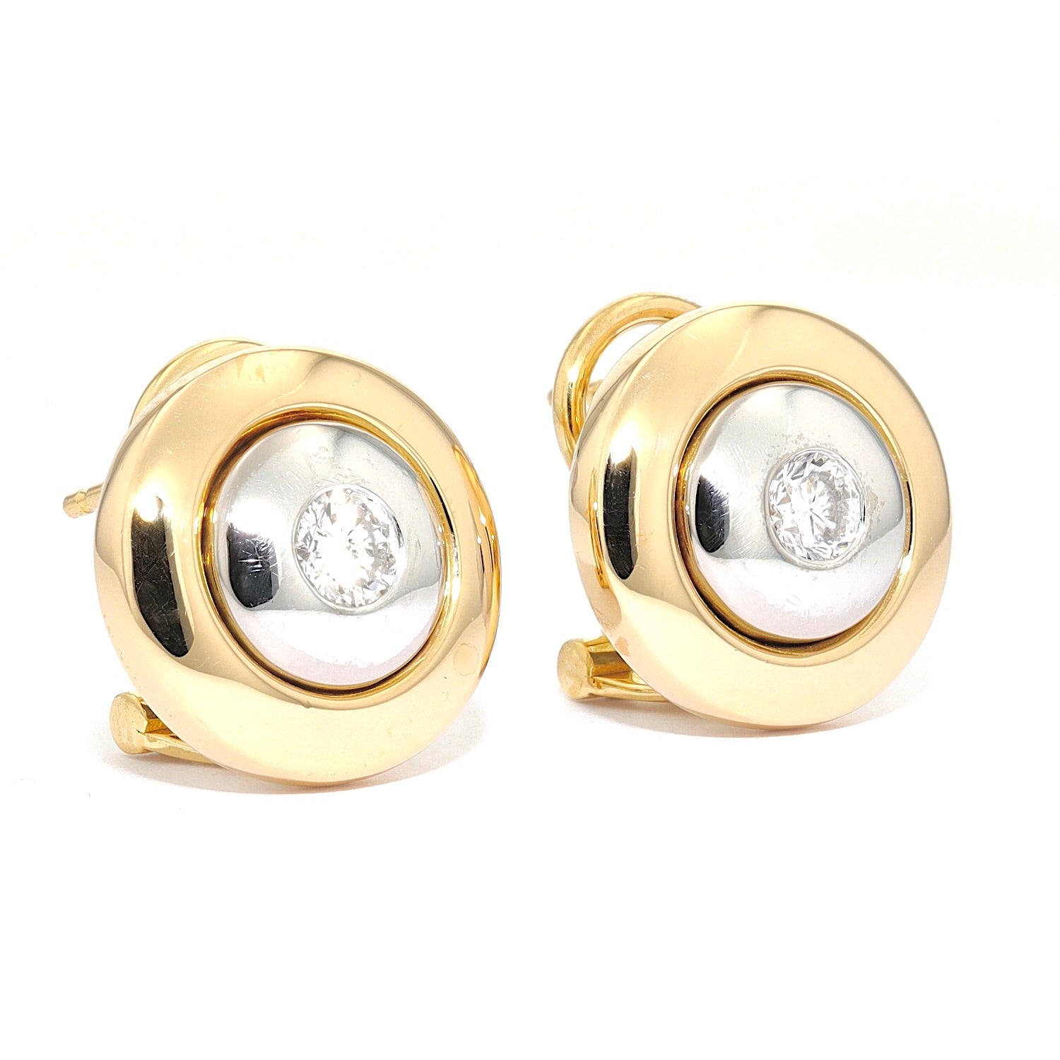 1 Paar Ohrstecker in 750er Gold Bicolor mit je einem Brillanten, liegend rechts gedreht