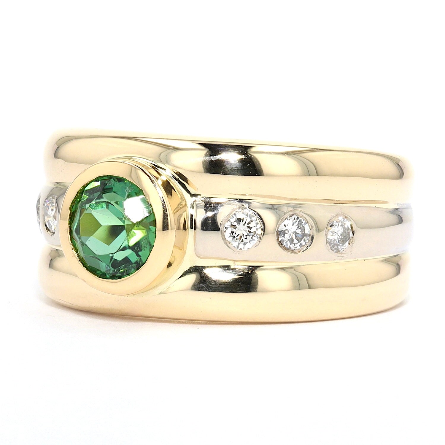 Ring in 585er Bicolor Gold mit Brillanten und einem Turmalin, liegend links gedreht