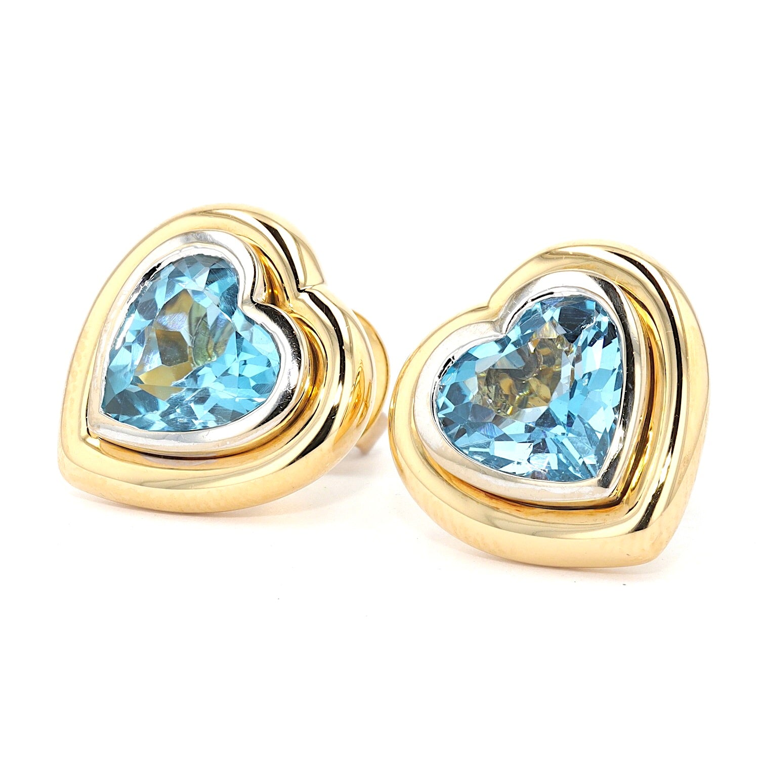 1 Paar Ohrstecker in 585er Bicolor Gold mit je einem blauen Topas, liegend links gedreht