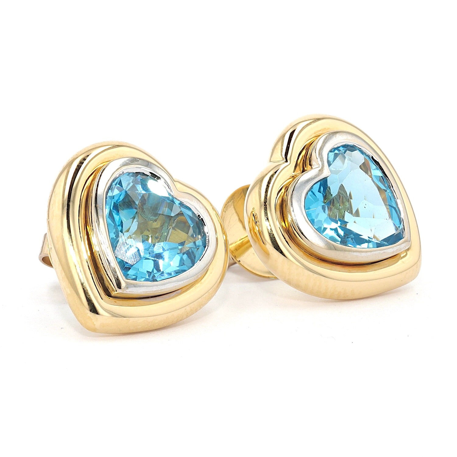 1 Paar Ohrstecker in 585er Bicolor Gold mit je einem blauen Topas, liegend rechts gedreht