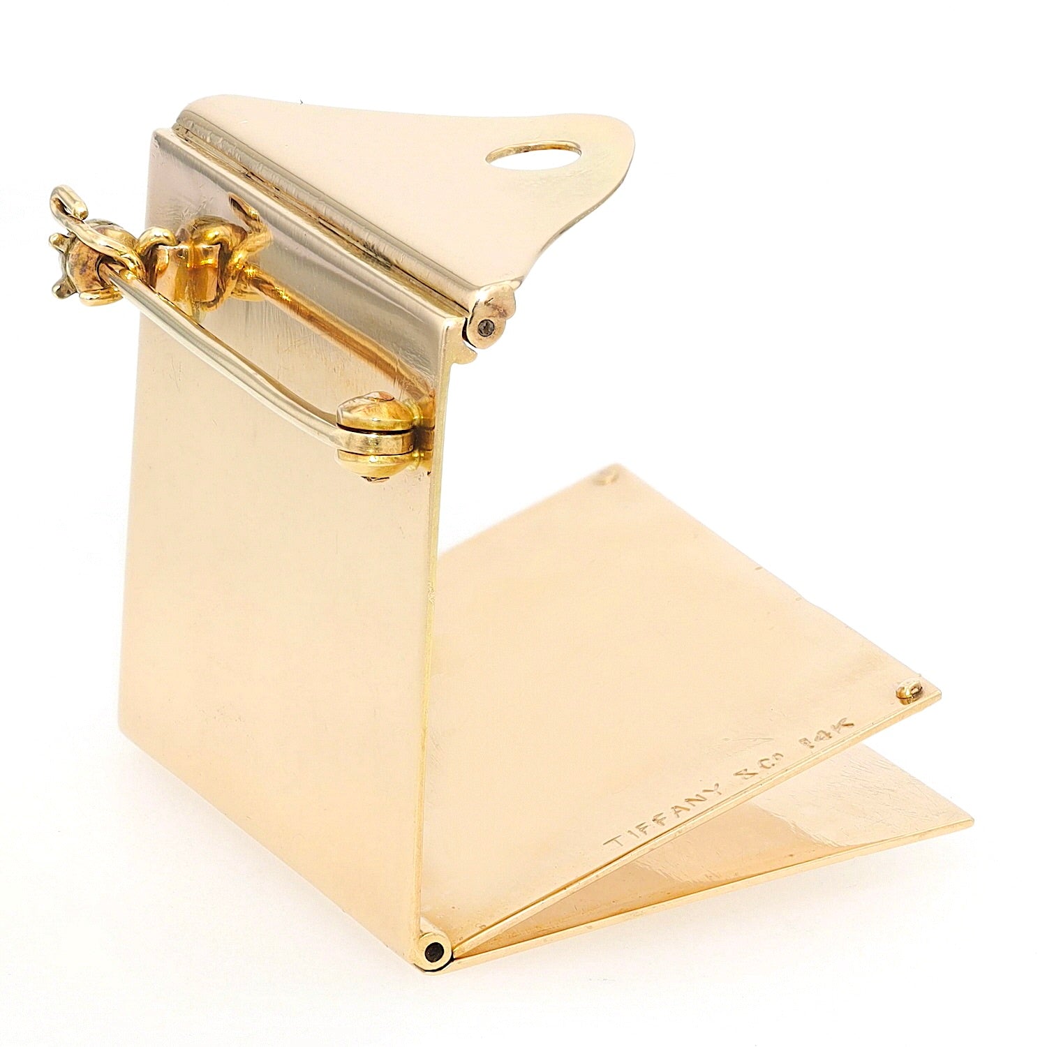 Tiffany & Co. Brosche in 585er Gelbgold mit einem Rubin-Cabochon, liegend rechts gedreht