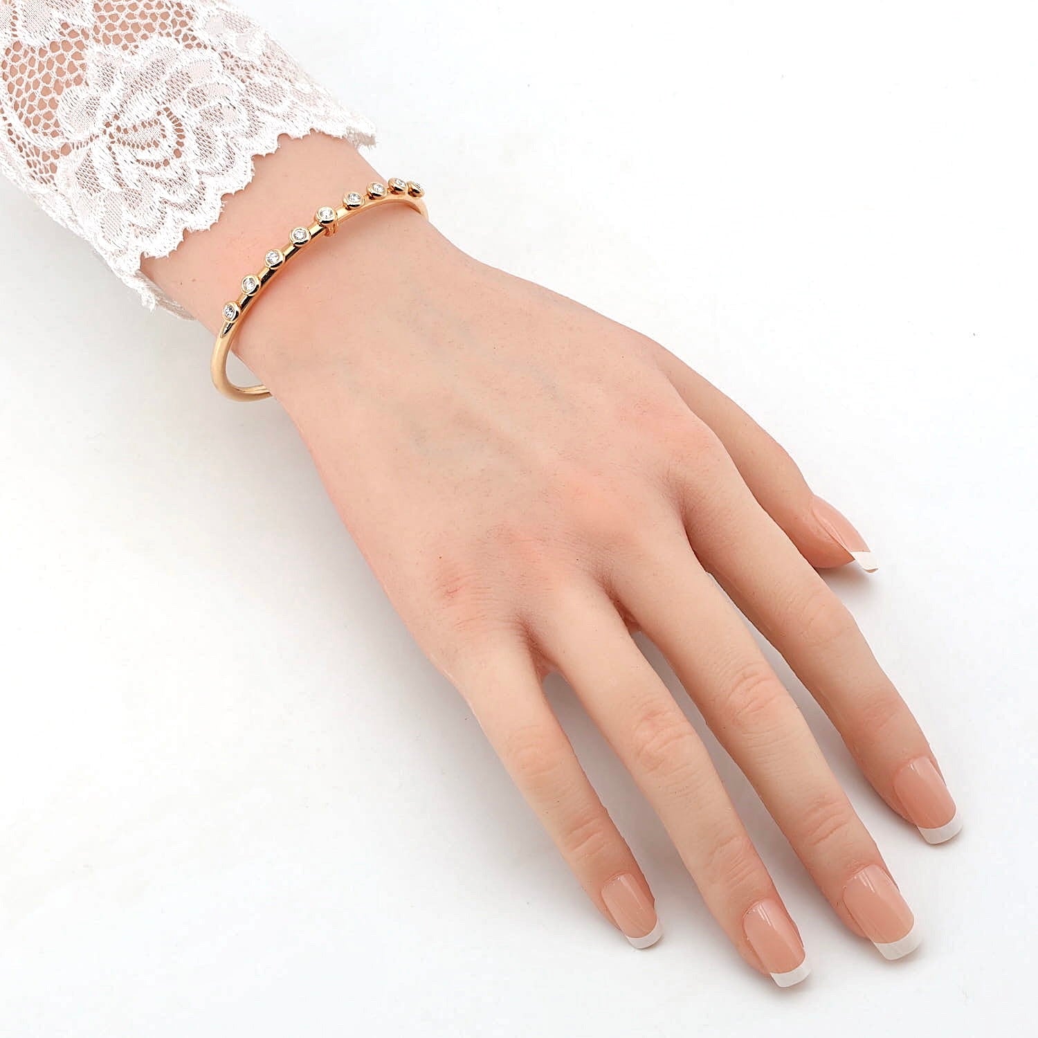 Dámaso Armspange in 750er Rotgold mit ca. 0,62 ct Brillanten, am Arm