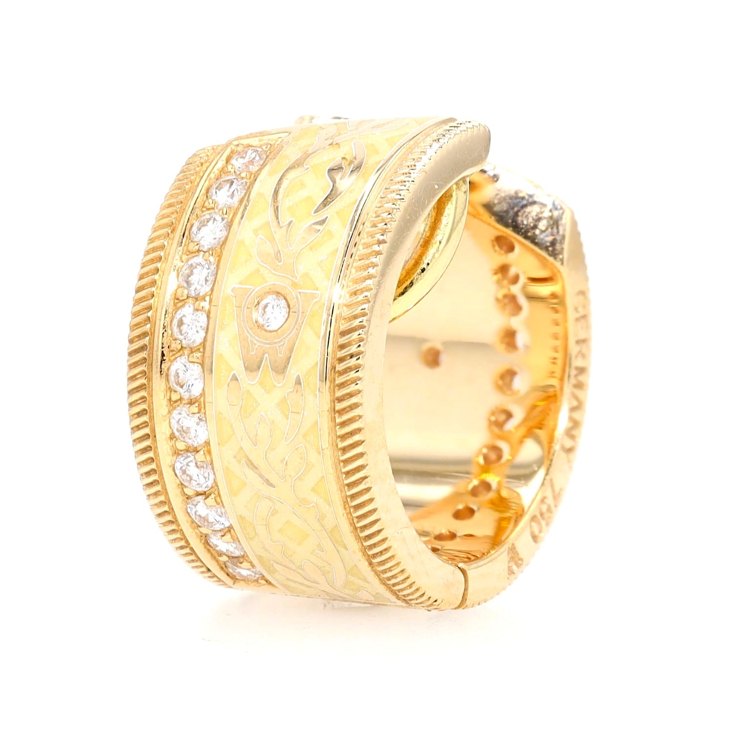 Wellendorff Kreolen “Schokotwist“ in 750er Gelbgold mit zweifarbiger Kaltemaille und Brillanten, stehend