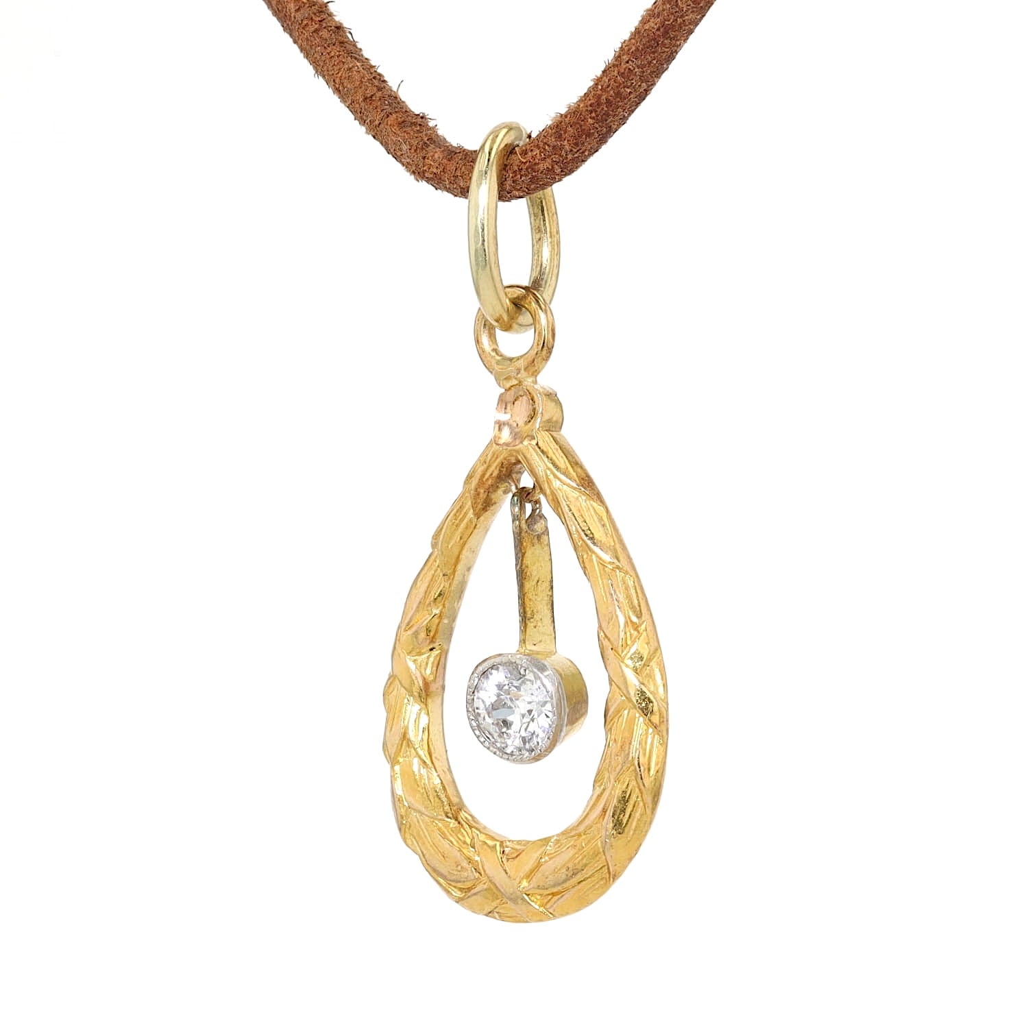 Anhänger in 750er/585er Gelbgold, Platin mit einem Diamanten, hängend rechts gedreht