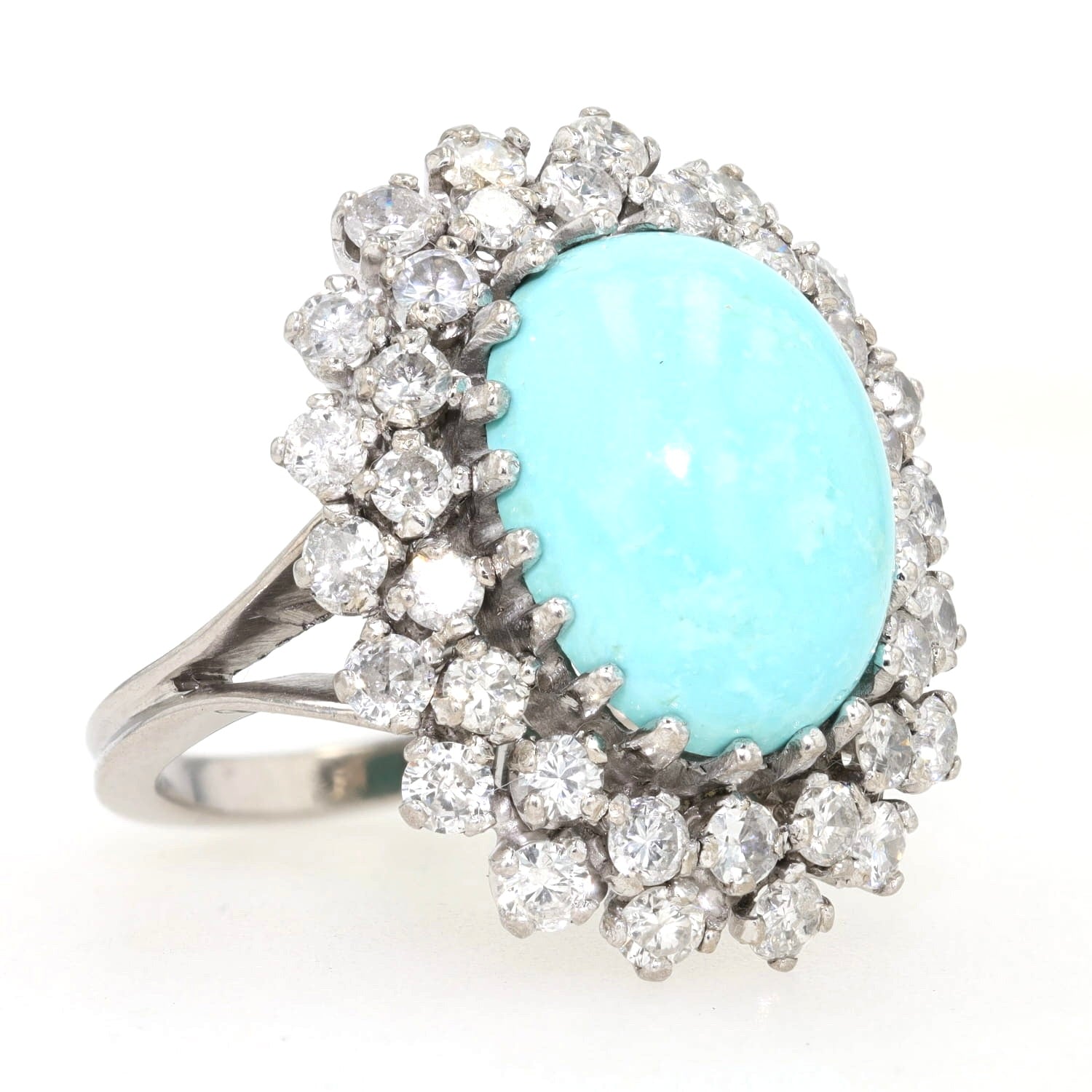 Vintage Ring in 750er Weißgold mit einem großen Türkis und insgesamt ca. 2 ct Brillanten, liegend rechts gedreht