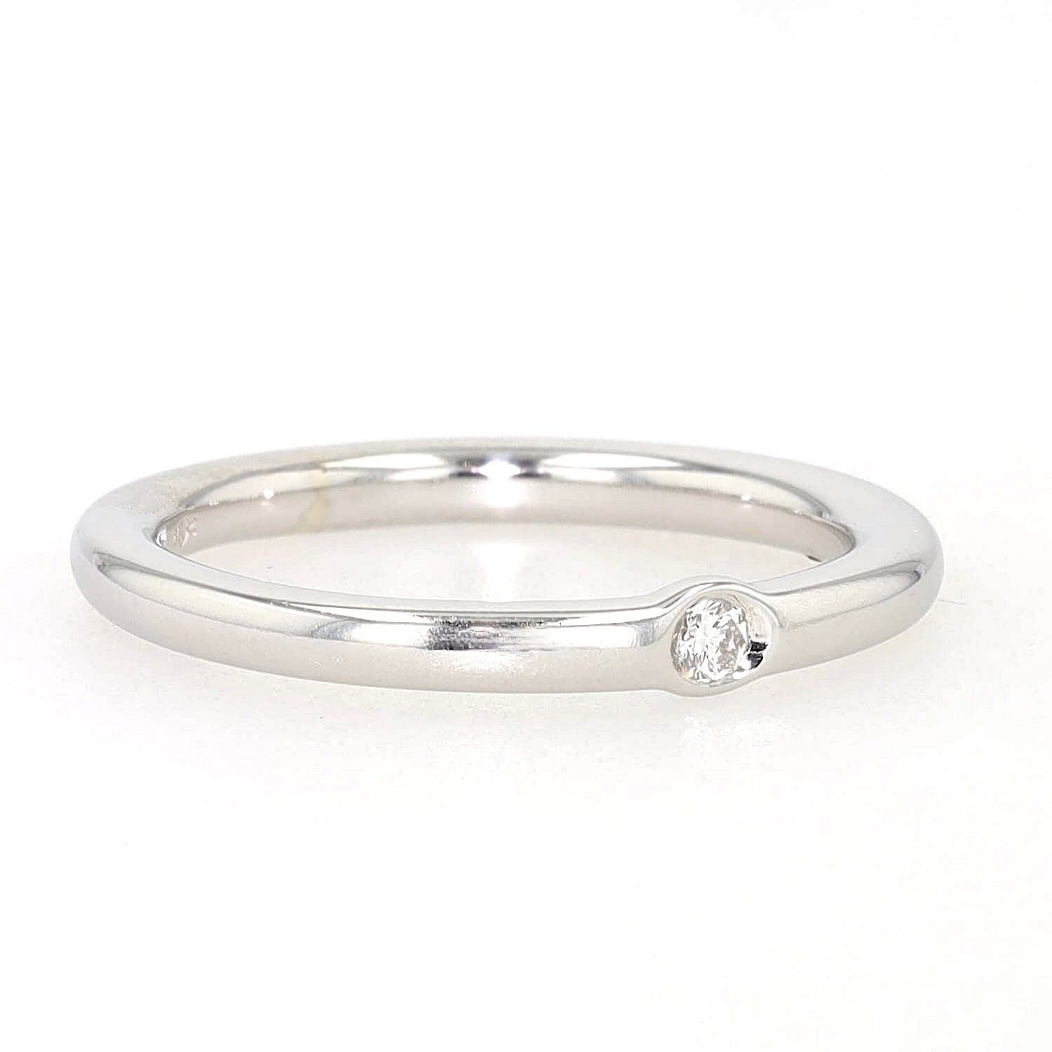 Niessing Solitär Ring in Platin mit einem Brillanten, liegend rechts gedreht