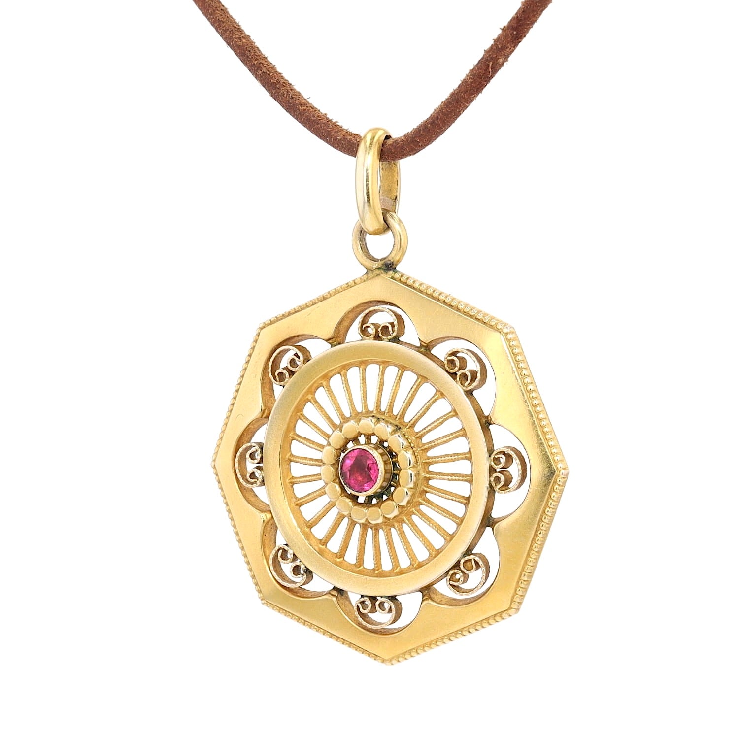 Jugendstil Anhänger in 333er Gelbgold mit einem roten Glasstein, hängend links gedreht an einer braunen Kordel