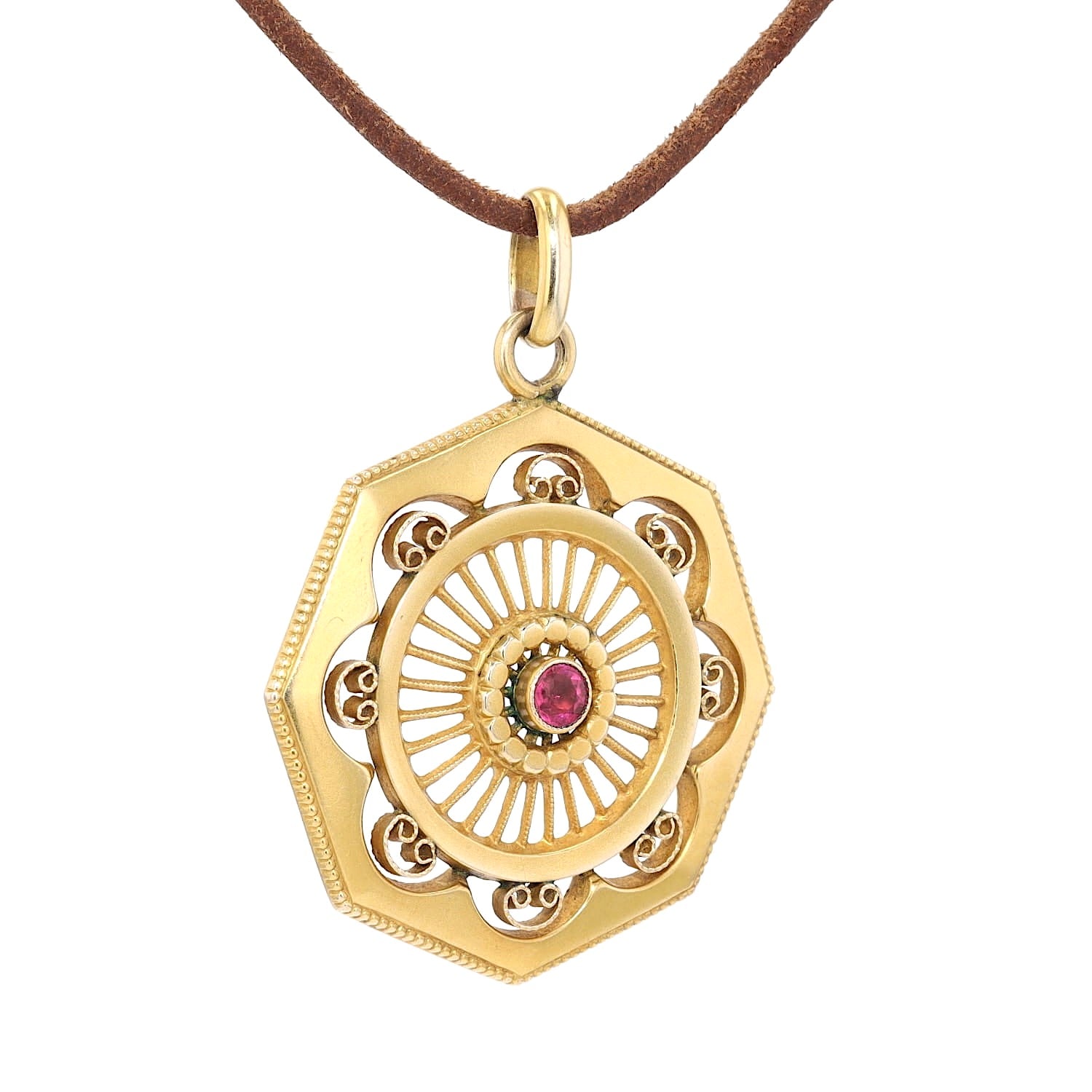 Jugendstil Anhänger in 333er Gelbgold mit einem roten Glasstein, hängend rechts gedreht an einer braunen Kordel