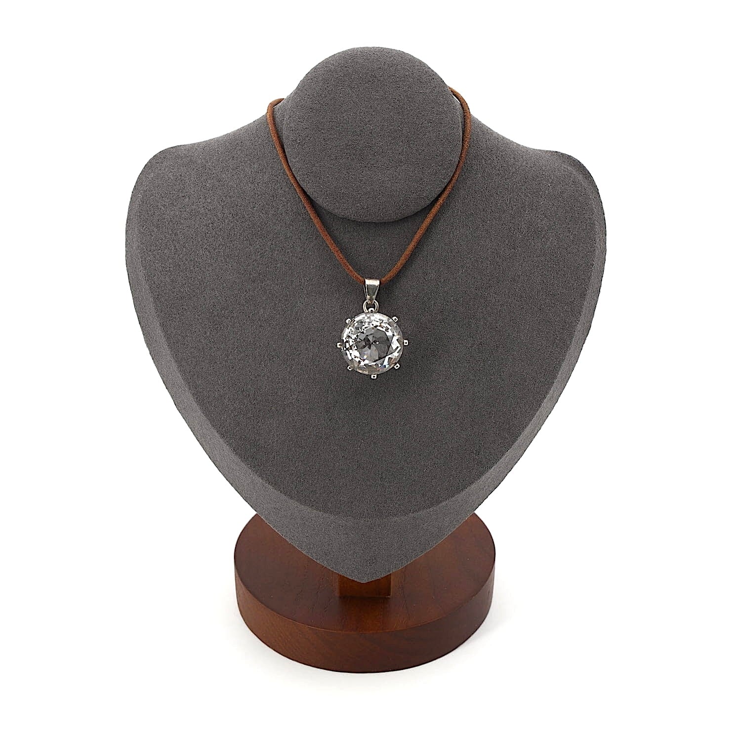 Anhänger in 835er Silber mit einem großen Bergkristall, an einer dunklen Büste