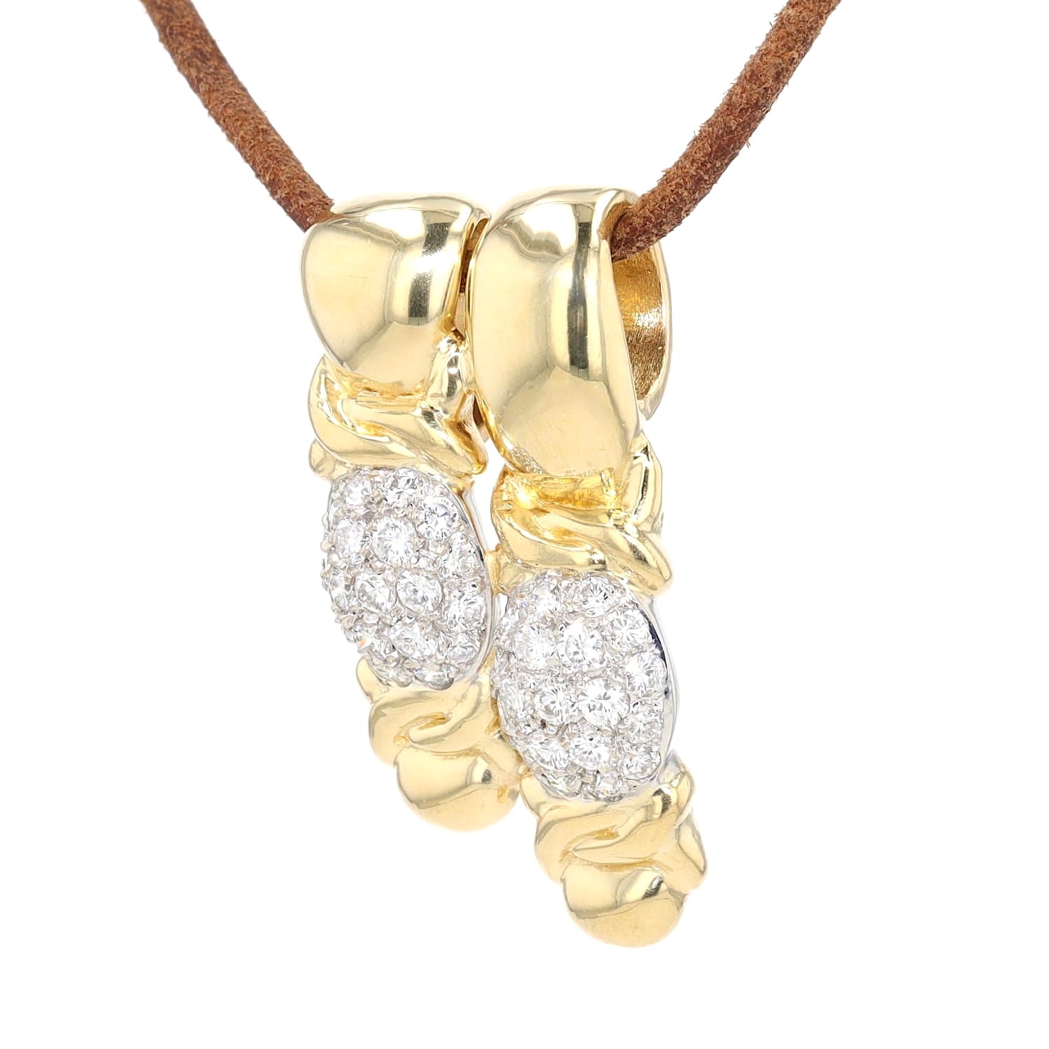 Anhänger in 750er Gelbgold mit Brillanten, hängend an einem braunen Lederband links gedreht