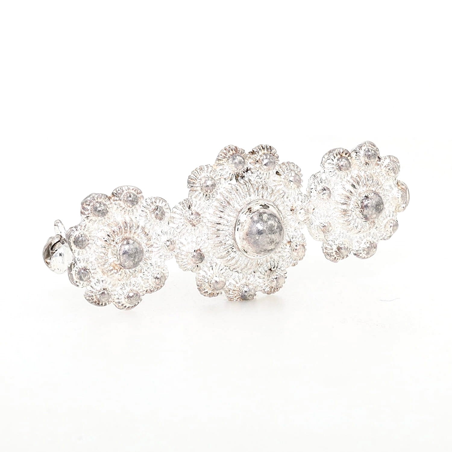 Traditional brooch made of 835 silver, turned lying on the right