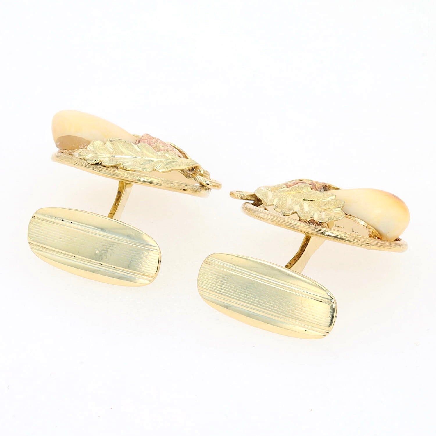 Manschettenknöpfe in 585er Gelbgold-Rotgold mit je einer Grandeln, liegend Rückseite