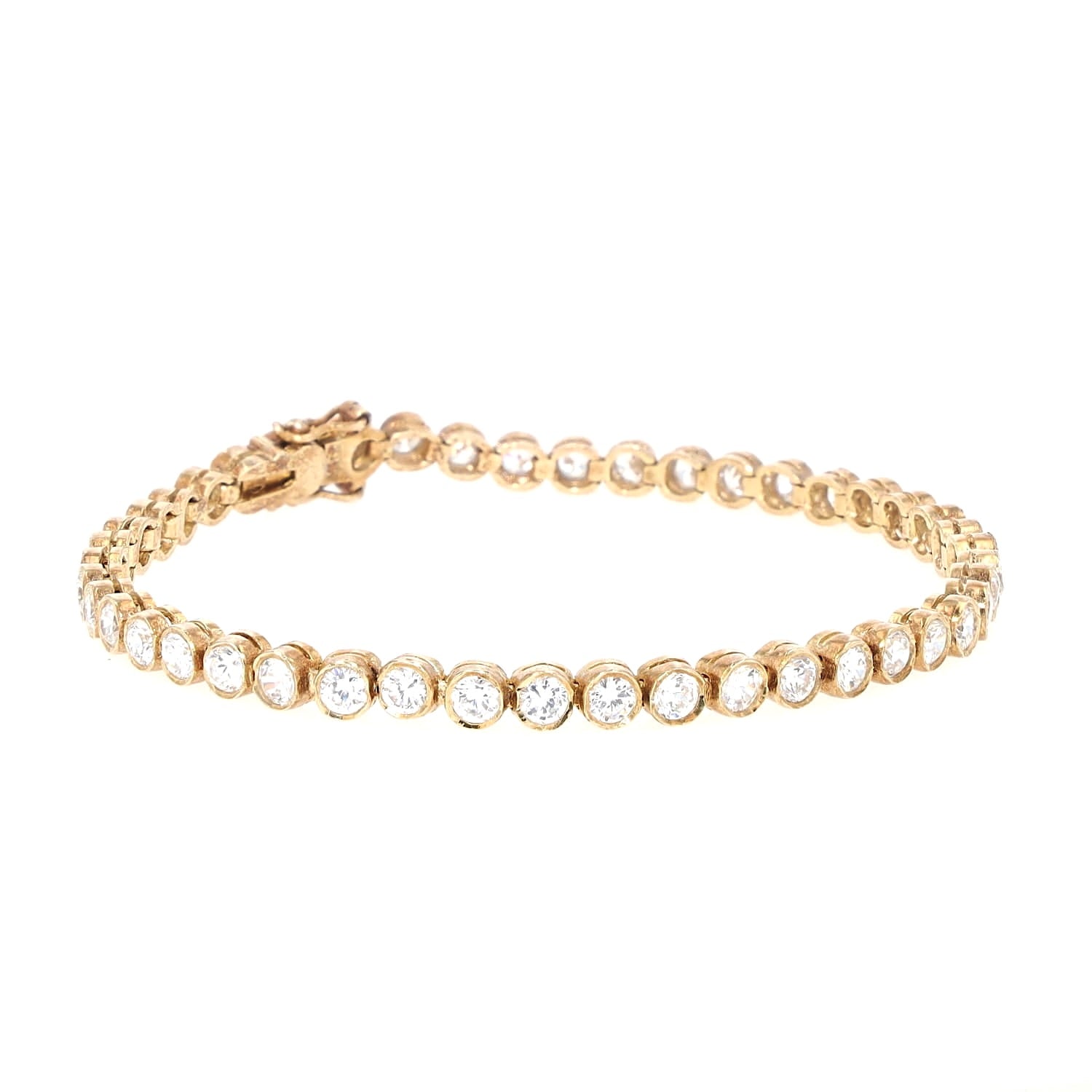 Tennisarmband in Silber, vergoldet mit Cubic Zirkonias liegend geschlossen leicht links gedreht