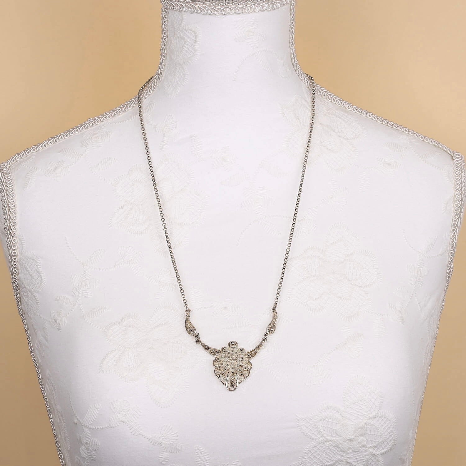 Long necklace chain made of 835 silver, long on a white bust