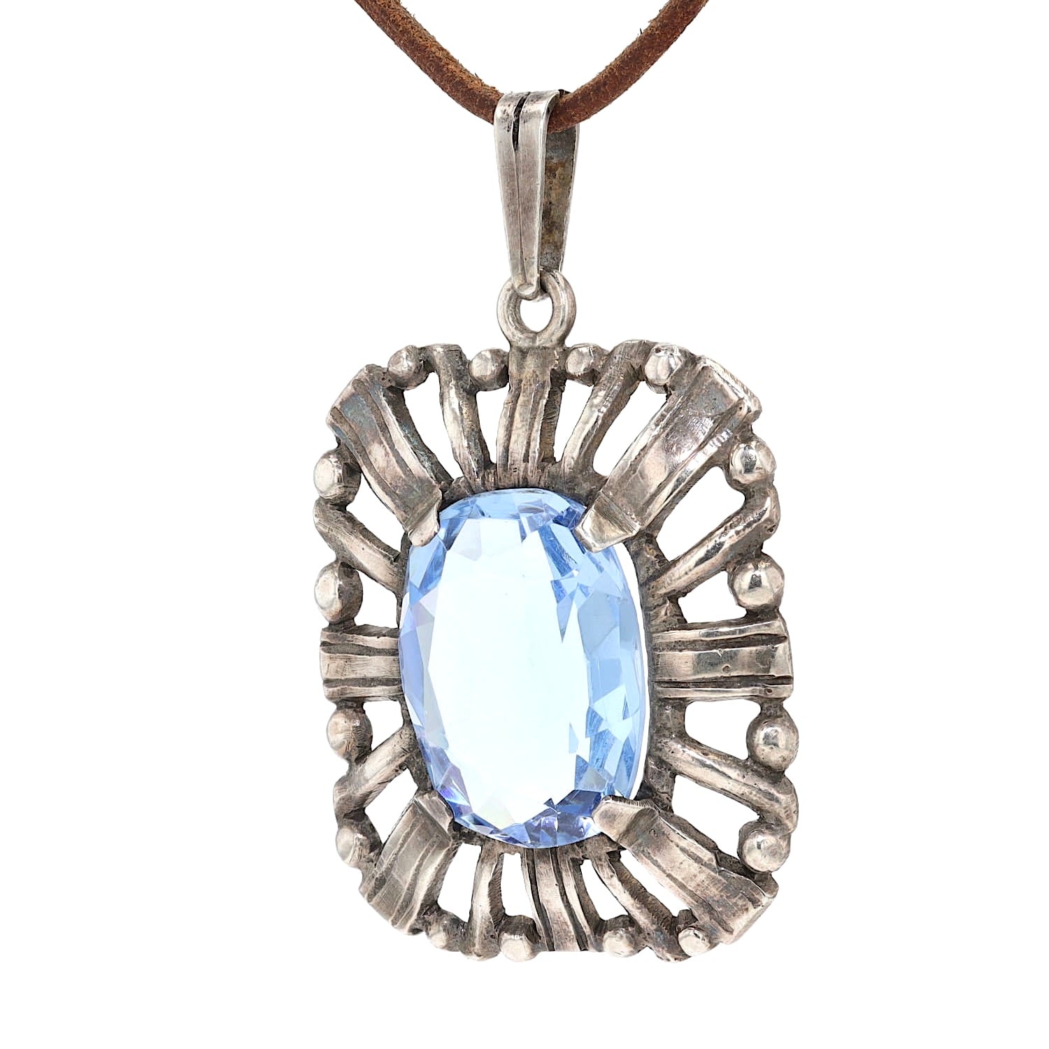 Art Déco Anhänger in 800er Silber mit einem blauen Glasstein, hängend links gedreht