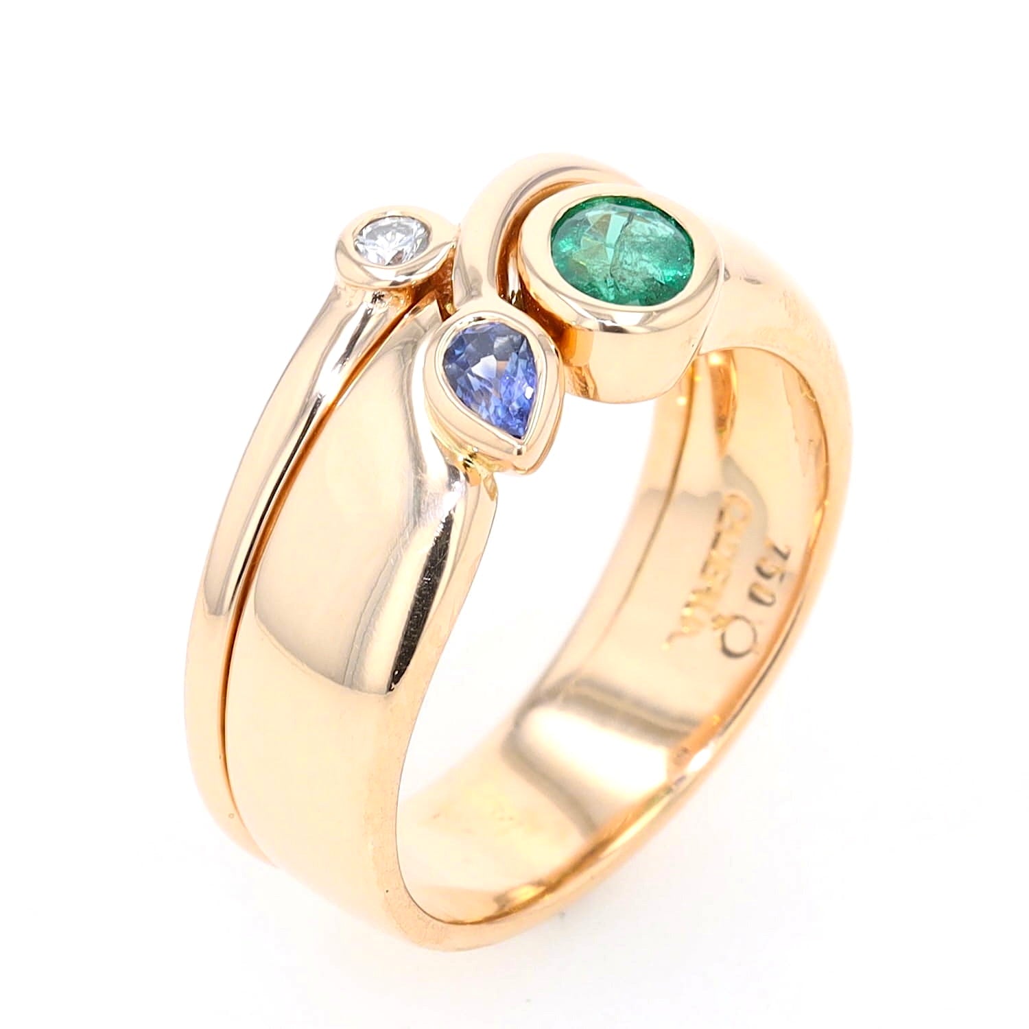 Cadeaux ring in 750 yellow gold with with a brilliant, a blue sapphire and an emerald, standing