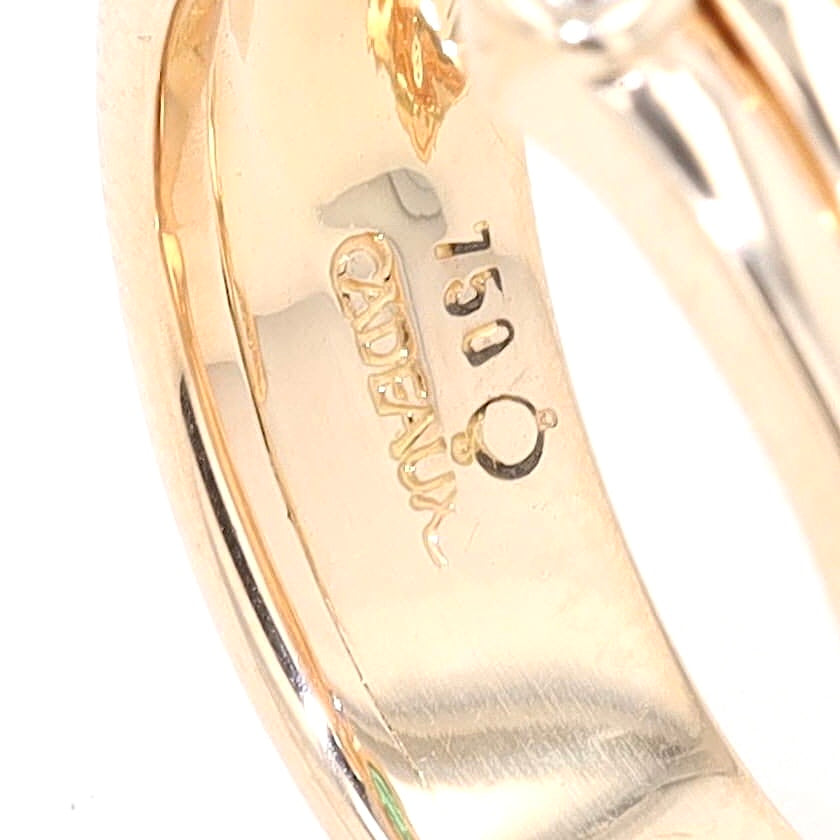 Cadeaux ring in 750 yellow gold with with a brilliant, a blue sapphire and an emerald, close-up of the hallmark