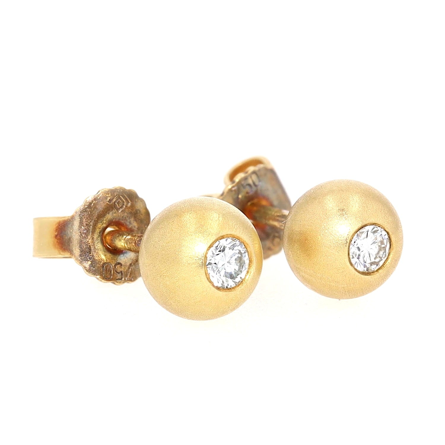 Ohrstecker in 750er Gelbgold mit je einem Brillanten, liegend rechts gedreht