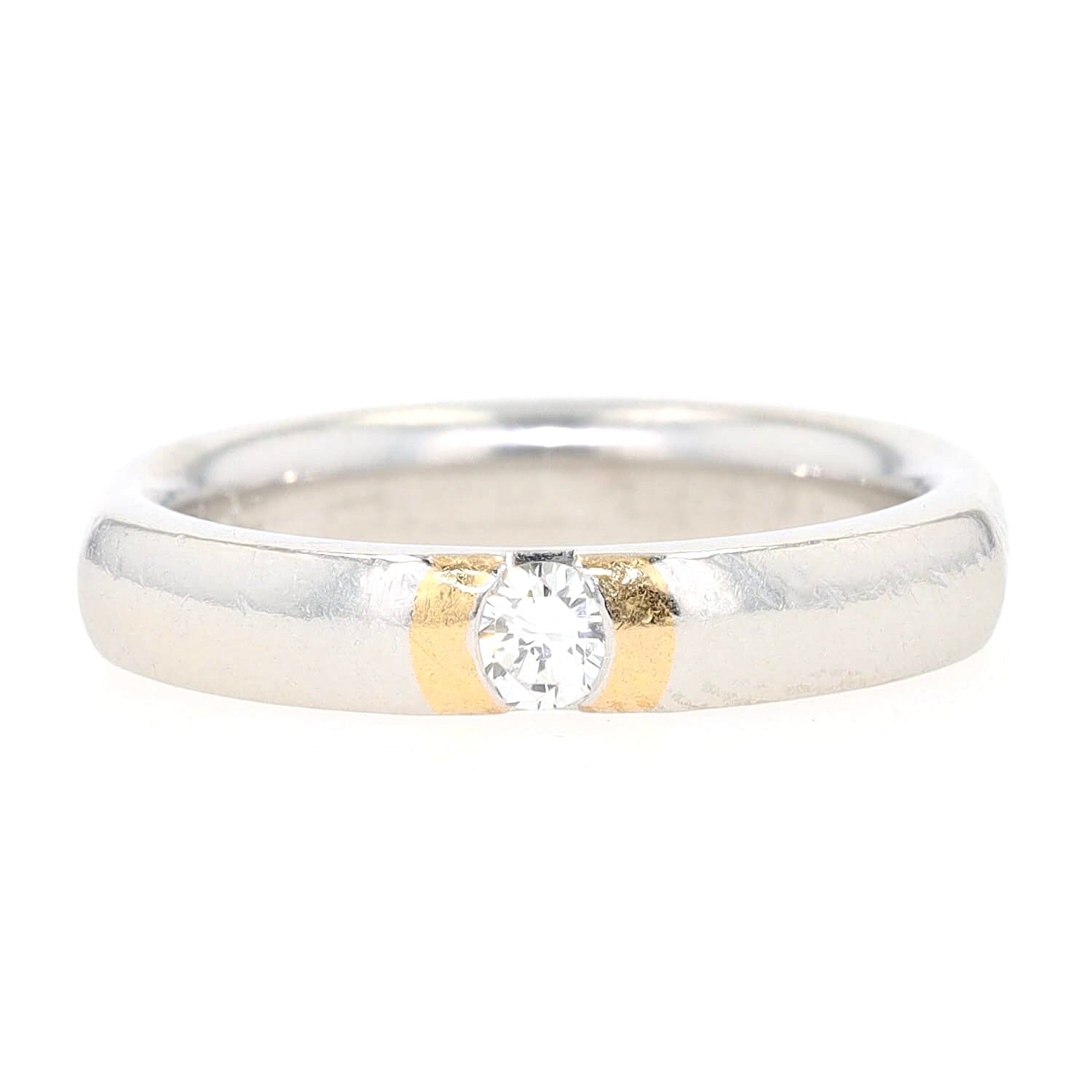 Henrich & Denzel Ring in 950er Platin mit Goldauflage und einem Brillanten ca. 0,10 ct, liegend frontal