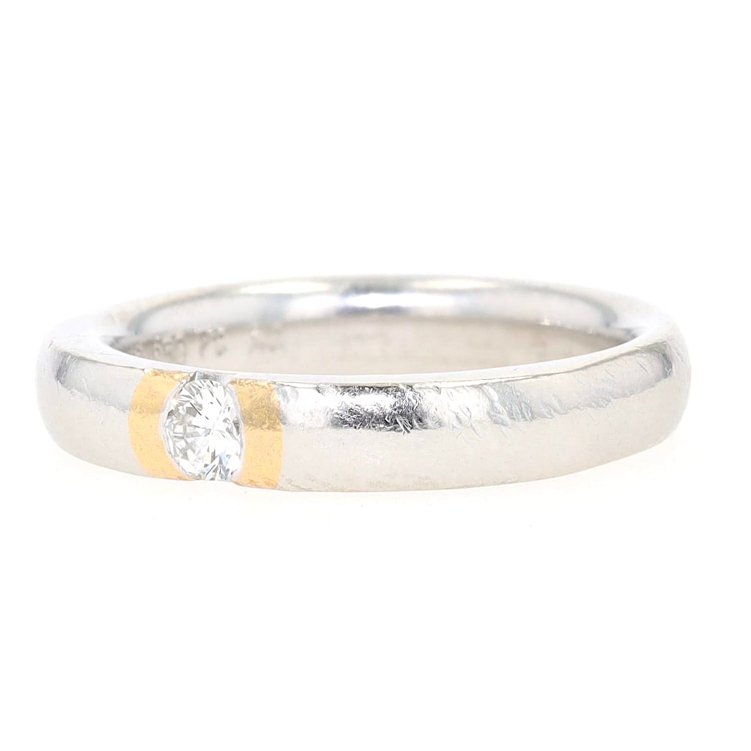 Henrich & Denzel Ring in 950er Platin mit Goldauflage und einem Brillanten ca. 0,10 ct, liegend links gedreht