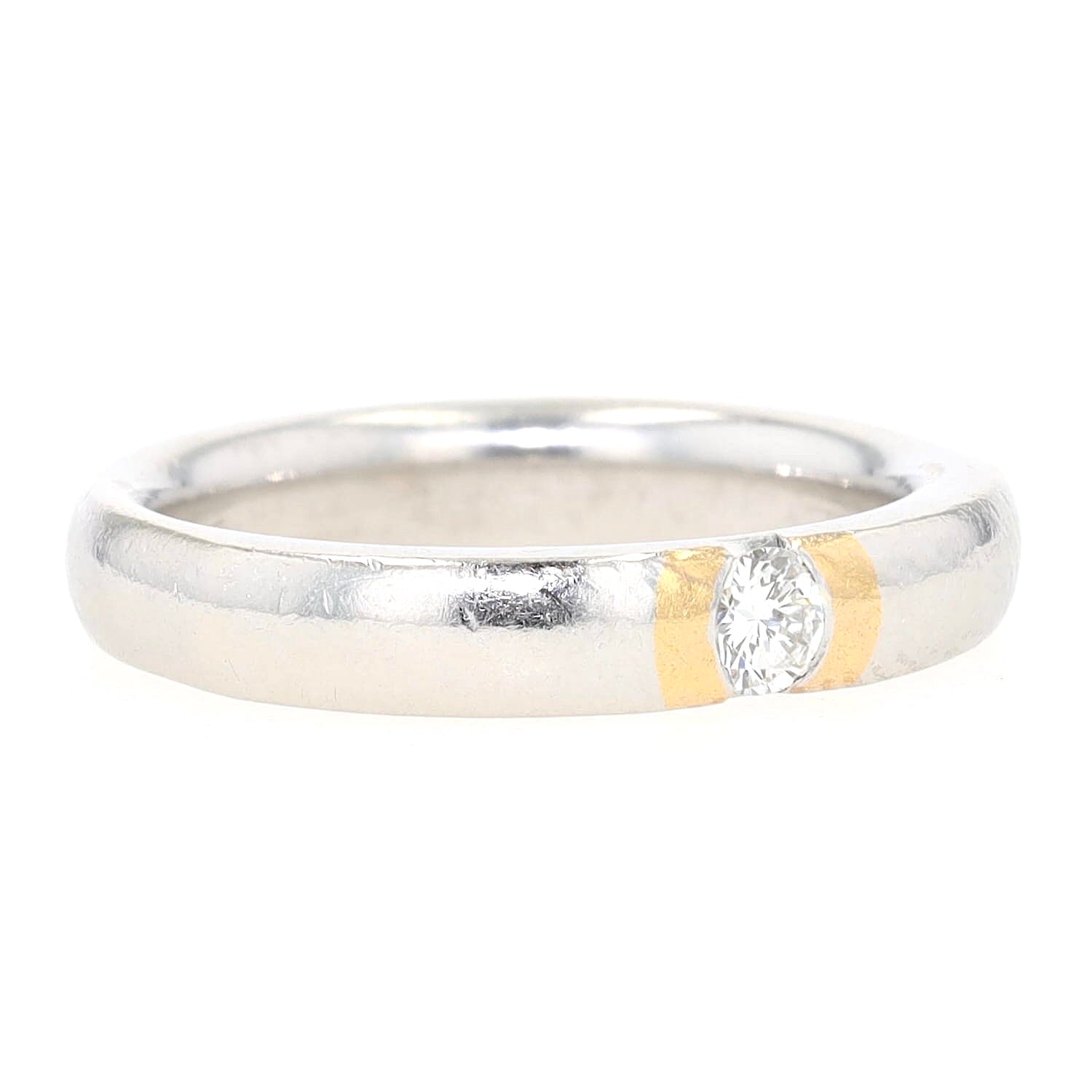 Henrich & Denzel Ring in 950er Platin mit Goldauflage und einem Brillanten ca. 0,10 ct, liegend rechts gedreht