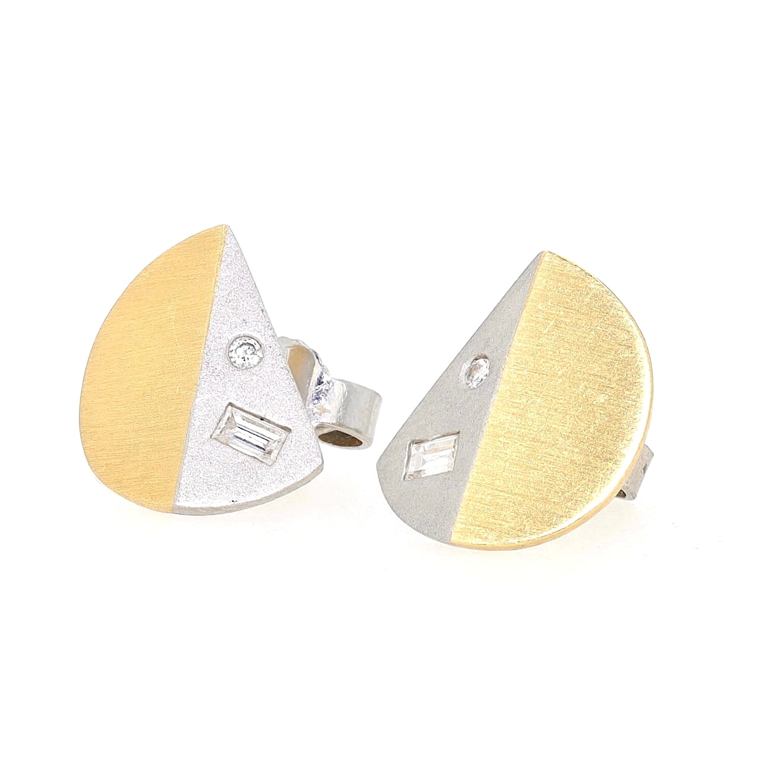 Stud earrings in platinum and 18k yellow gold with diamonds, turned left