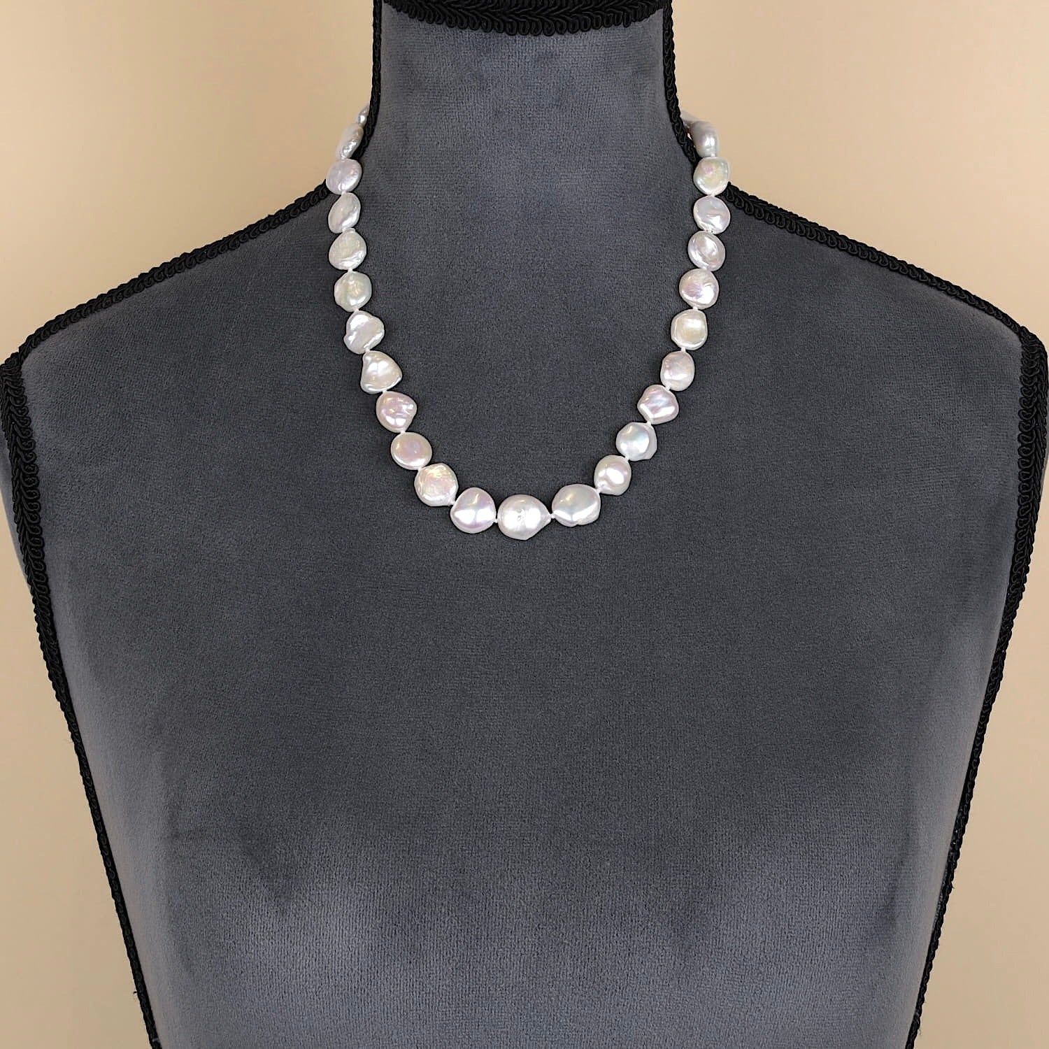 Keshi cultured pearl necklace, on a dark bust