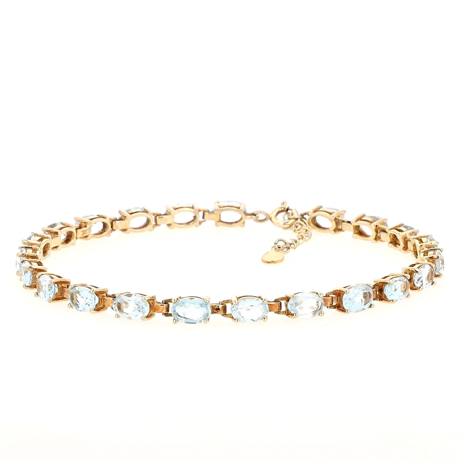 Armband in 925er Silber vergoldet mit blauen Topasen, liegend geschlossen links gedreht