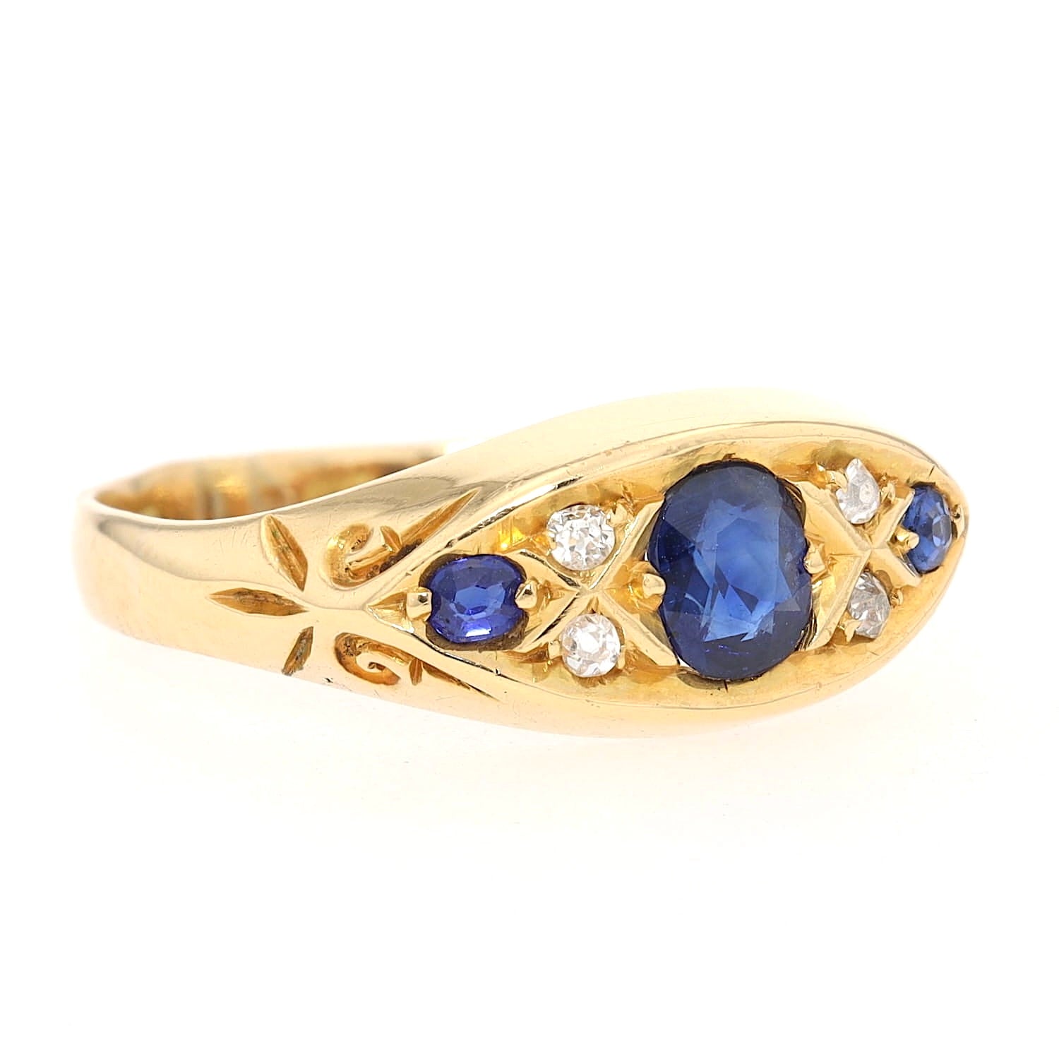Edwardian ring in 750 yellow gold with blue sapphires and diamonds, turned lying on the right