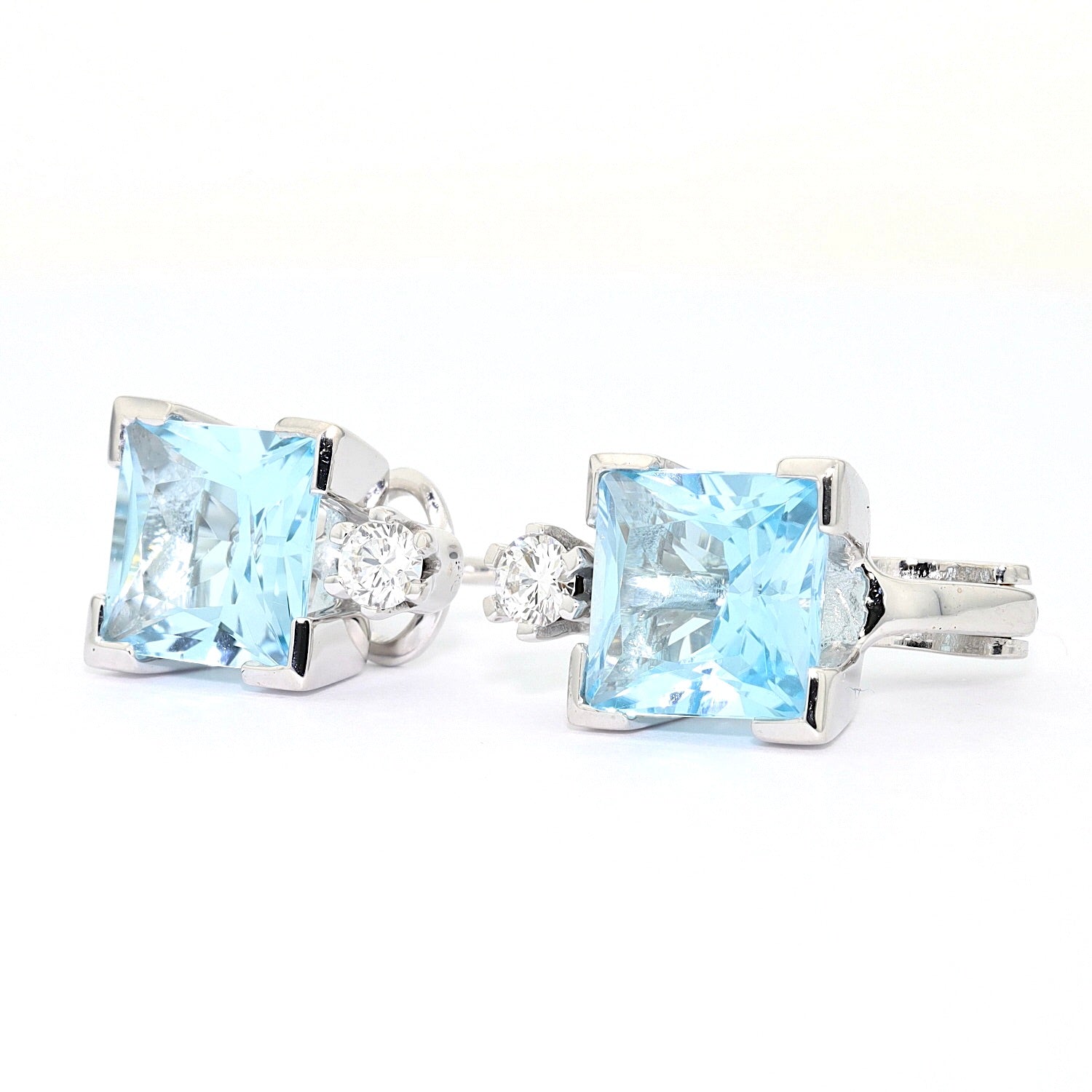 1 Paar Ohrstecker von Werner Zappe in 750er Weißgold mit Topasen und Brillanten, liegend frontal von vorne leicht links gedreht