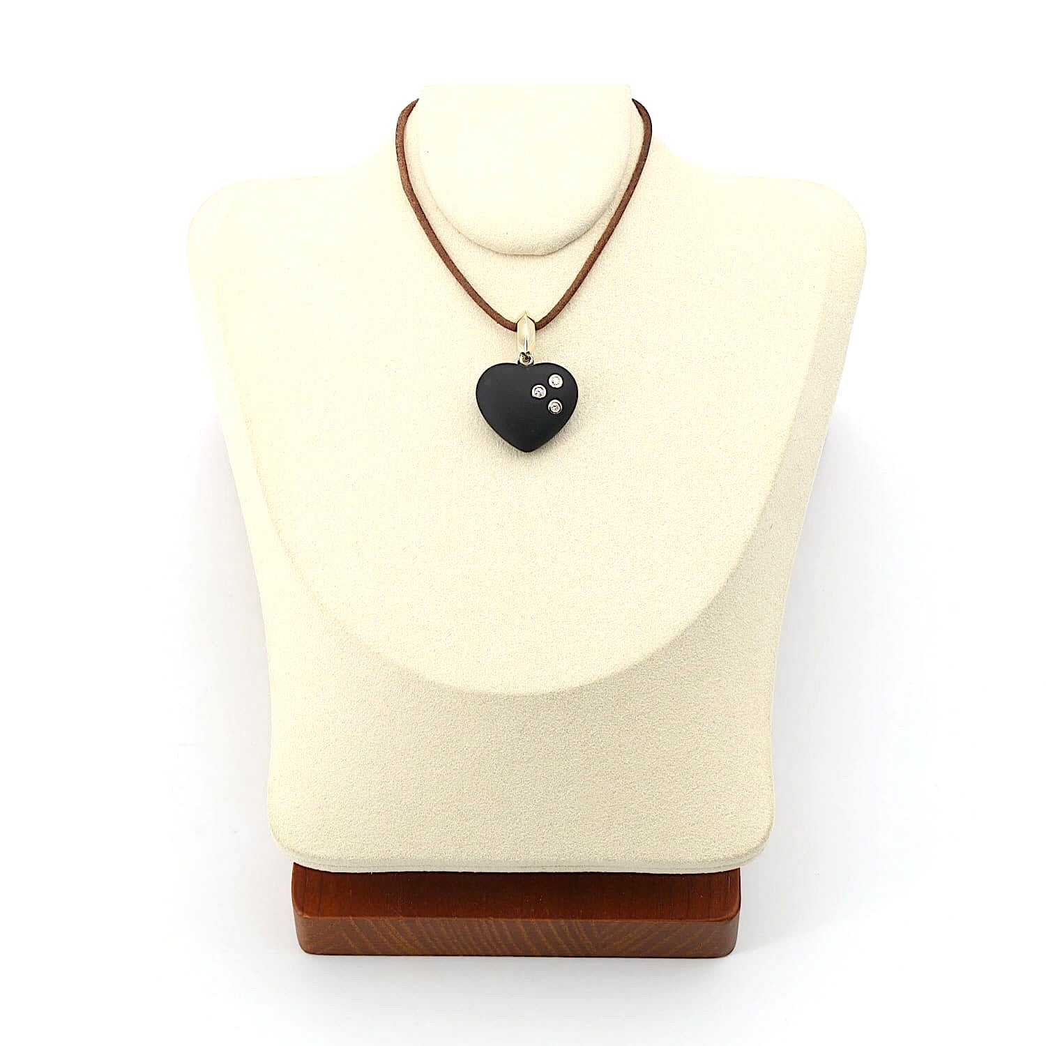 Pendant with an onyx heart, 585 gold and three Brilliants, on a light bust