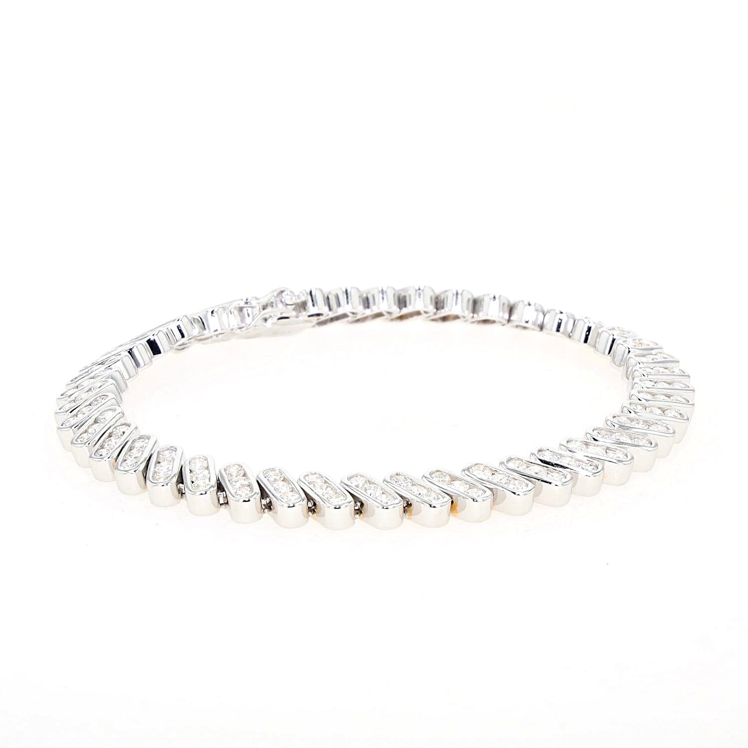 Tennis bracelet in 585 white gold with approx. 2.5 ct Brilliants, lying closed, turned slightly to the right with a slight top view