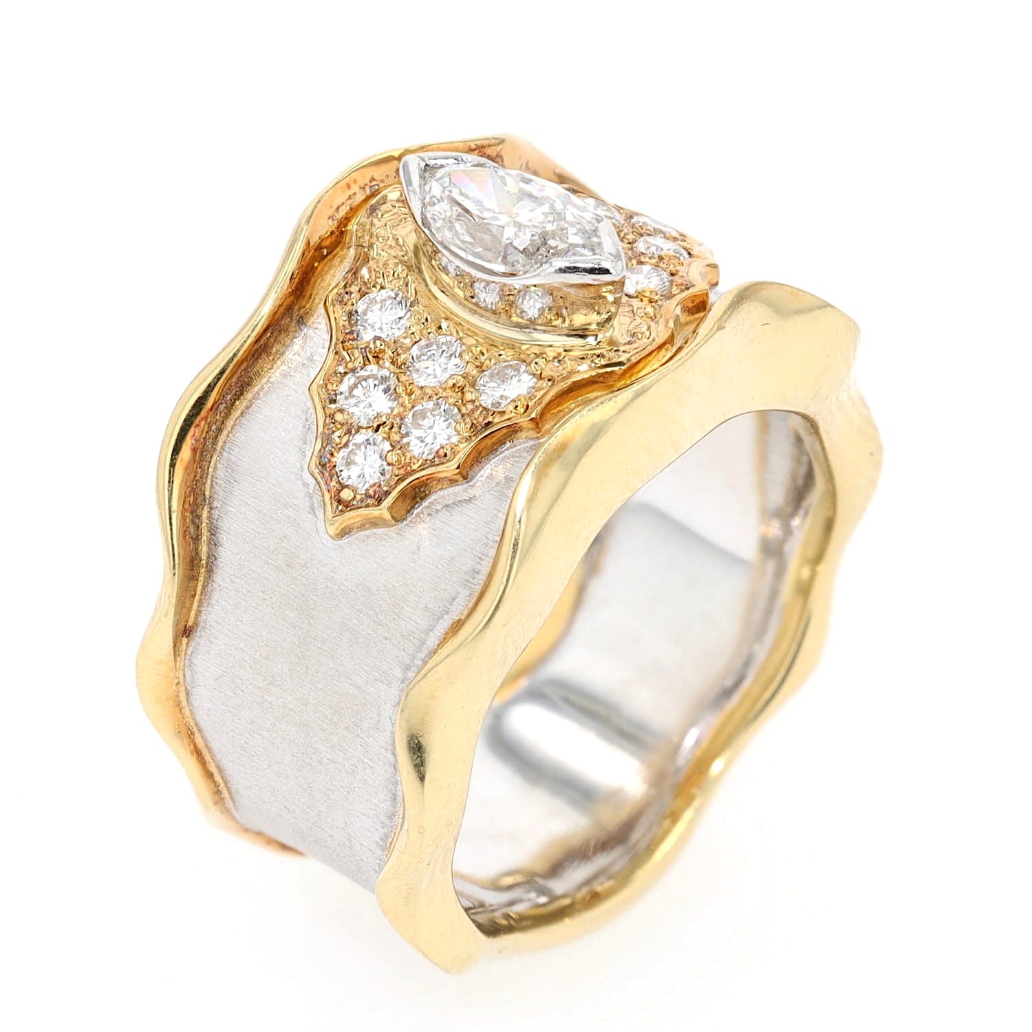 Unique ring in 750 yellow gold and platinum with a total of approx. 0.73 ct diamonds, standing