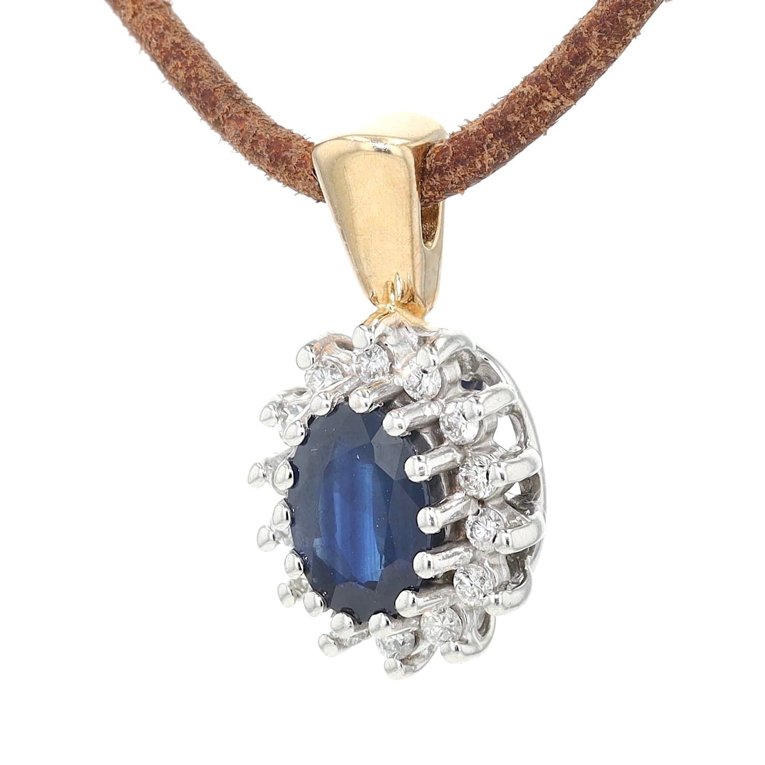 Anhänger von Christ in 585er Bicolor-Gold mit einem Saphir und Brillanten, hängend links gedreht