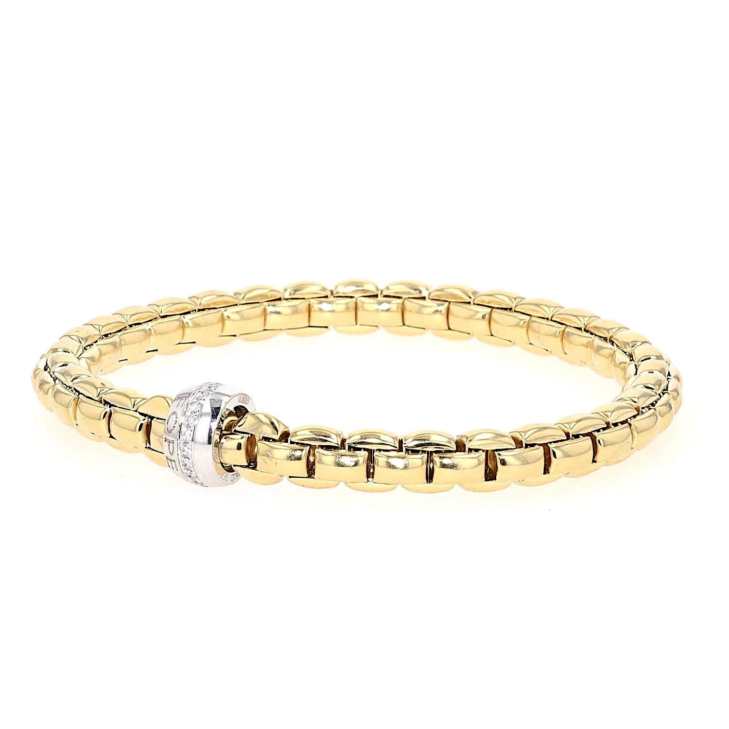 Fope Eka Flex`it Armband in 750er Gelbgold mit einer Ronde in Weißgold mit Brillanten liegend Ronde vorne links gedreht