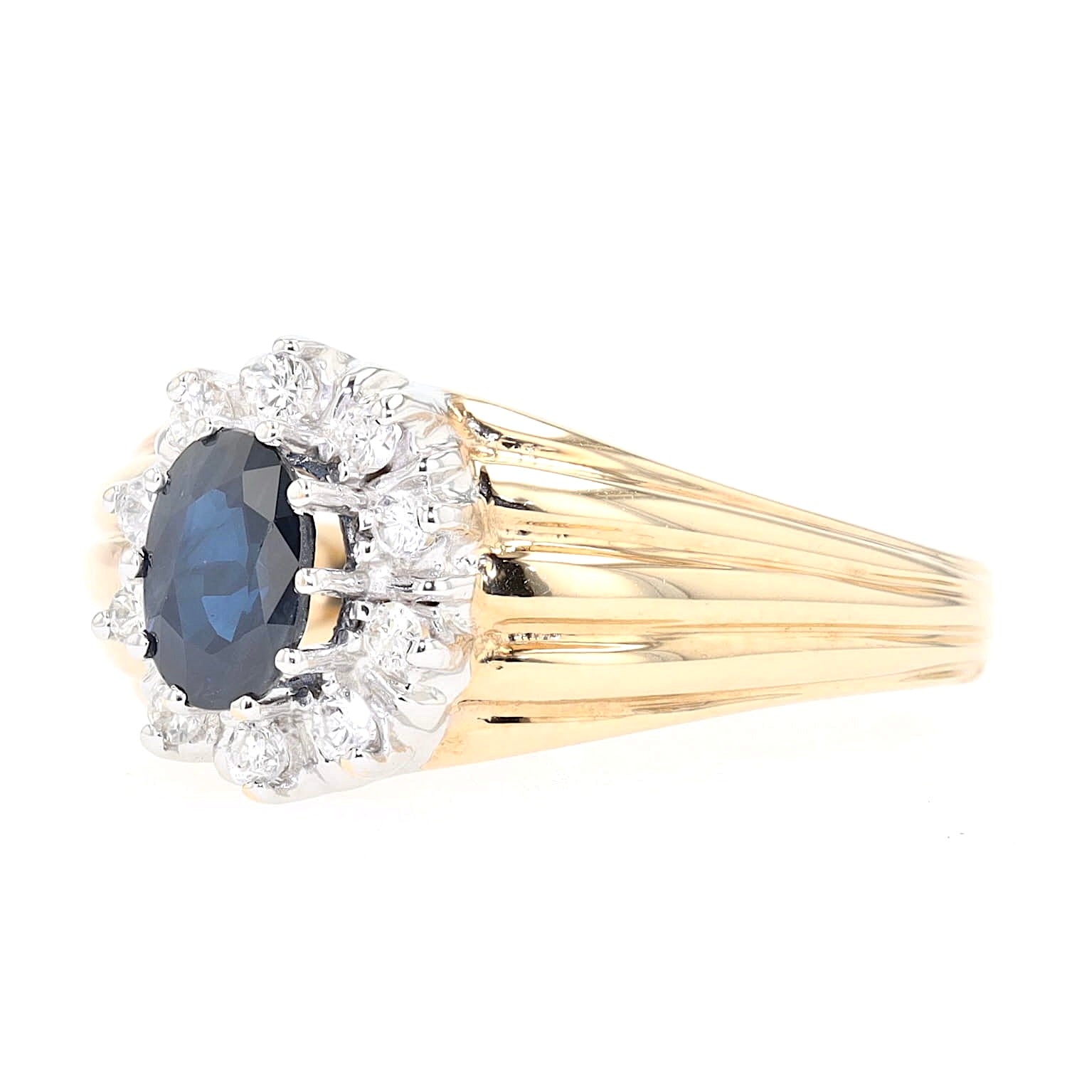 Ring in 585er Gelbgold mit einem Saphiren Brillanten, liegend links gedreht